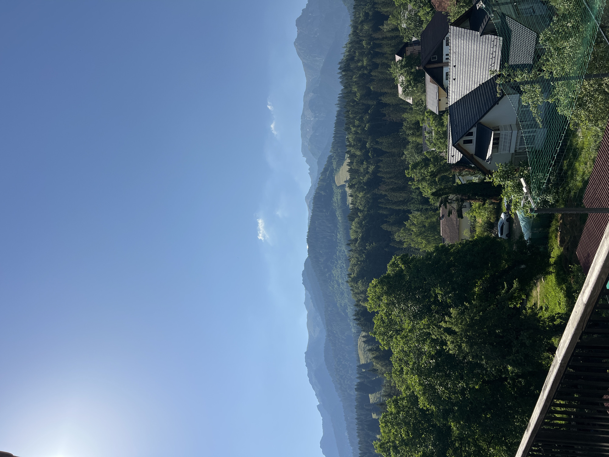 Balcony views over a quiet mountain village on a clear day