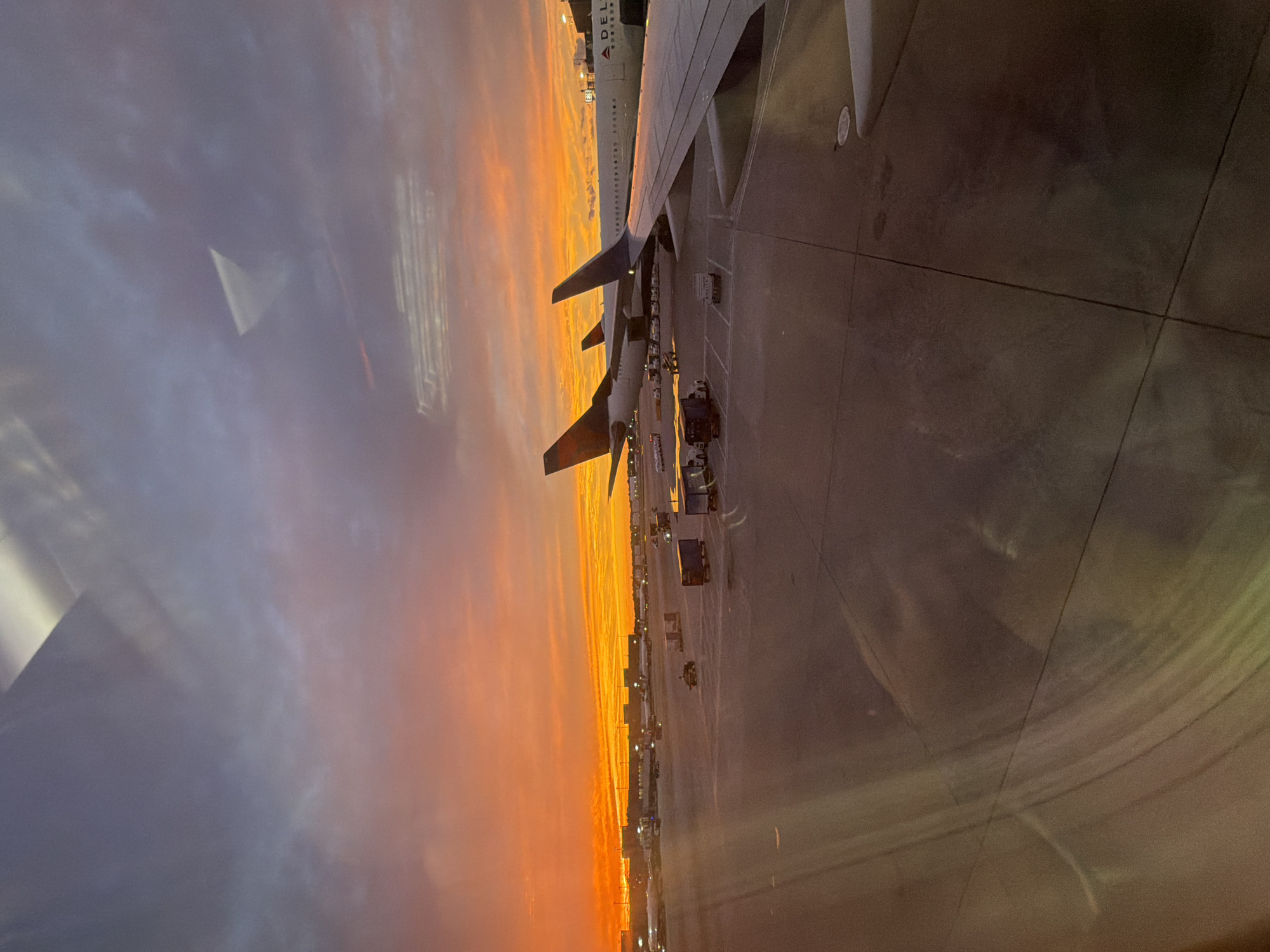 Sunset skies over Atlanta's Hartsfield-Jackson, seen from the tarmac.