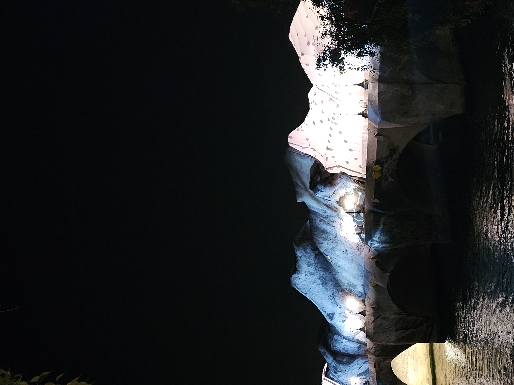 Nighttime scenes captured at illuminated Pont au Change bridge, Paris