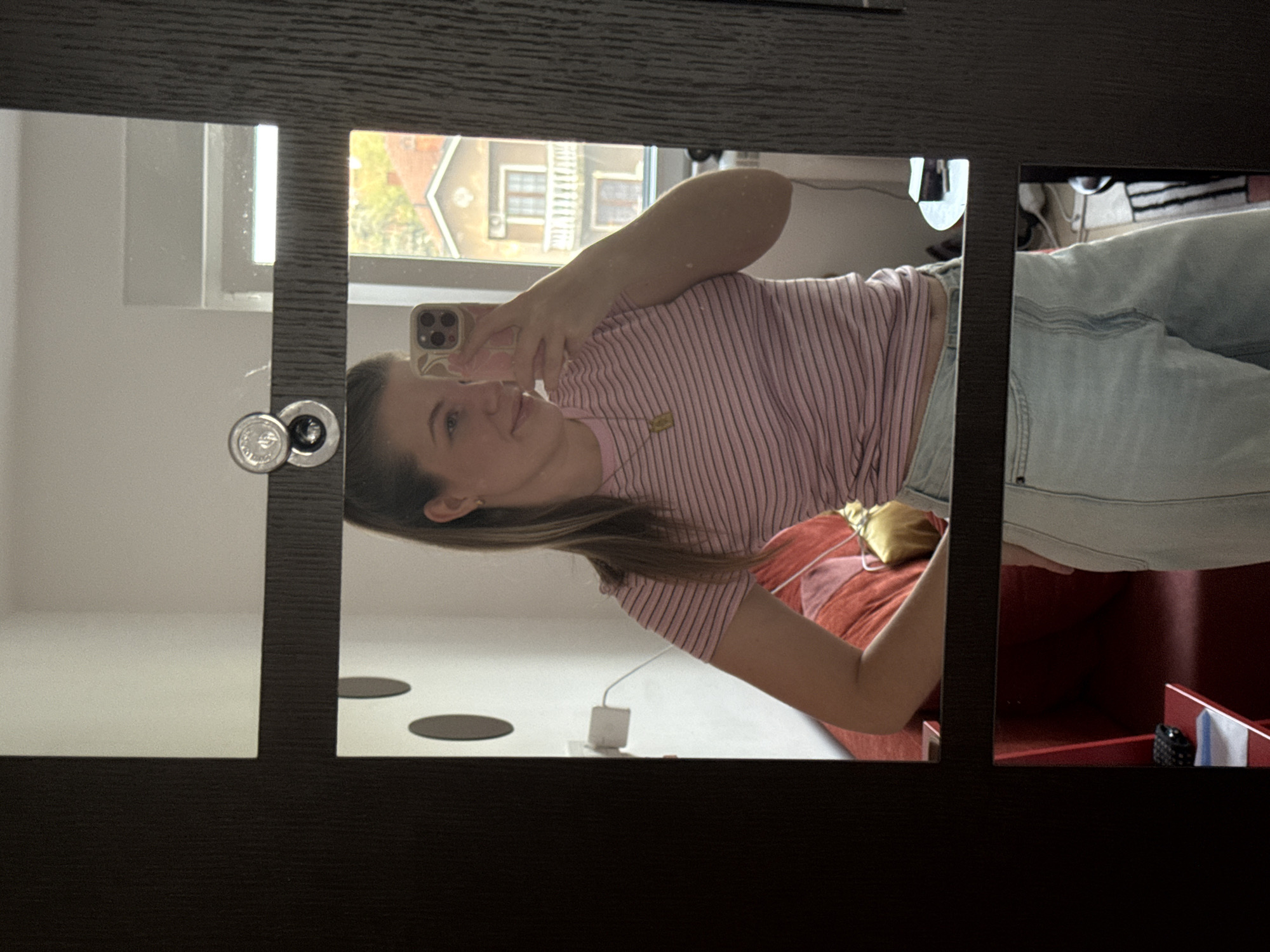 Woman takes mirror selfie in Belgrade suburb Friday morning