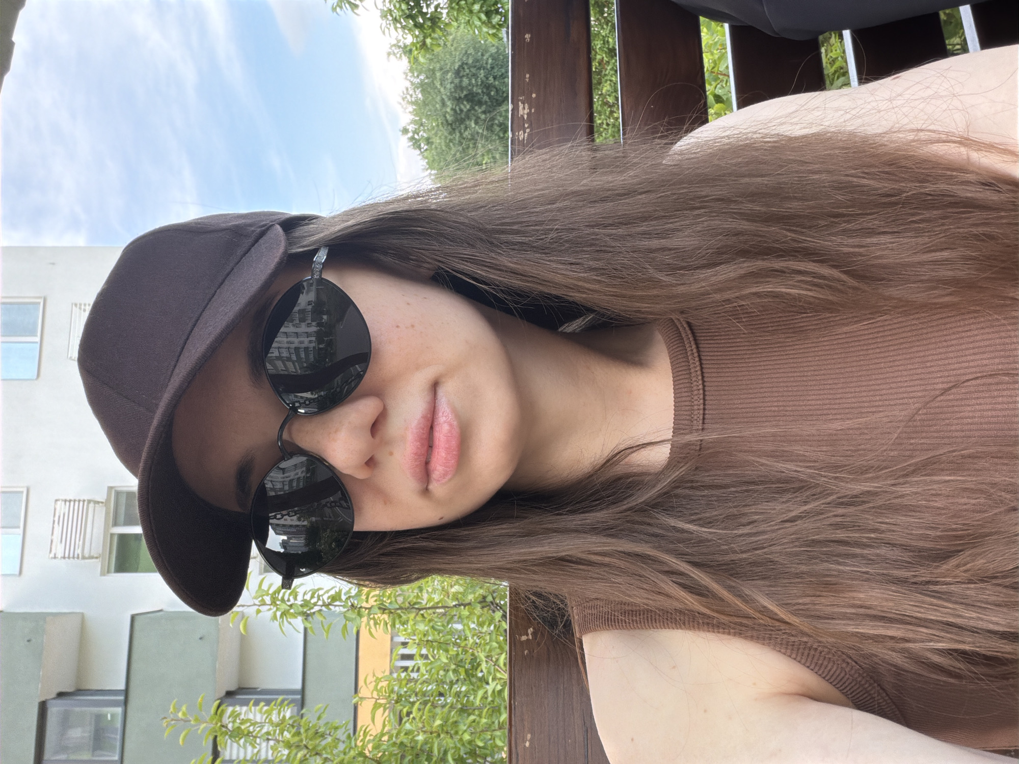 Relaxed outdoor bench moment in Kyiv on a summer afternoon