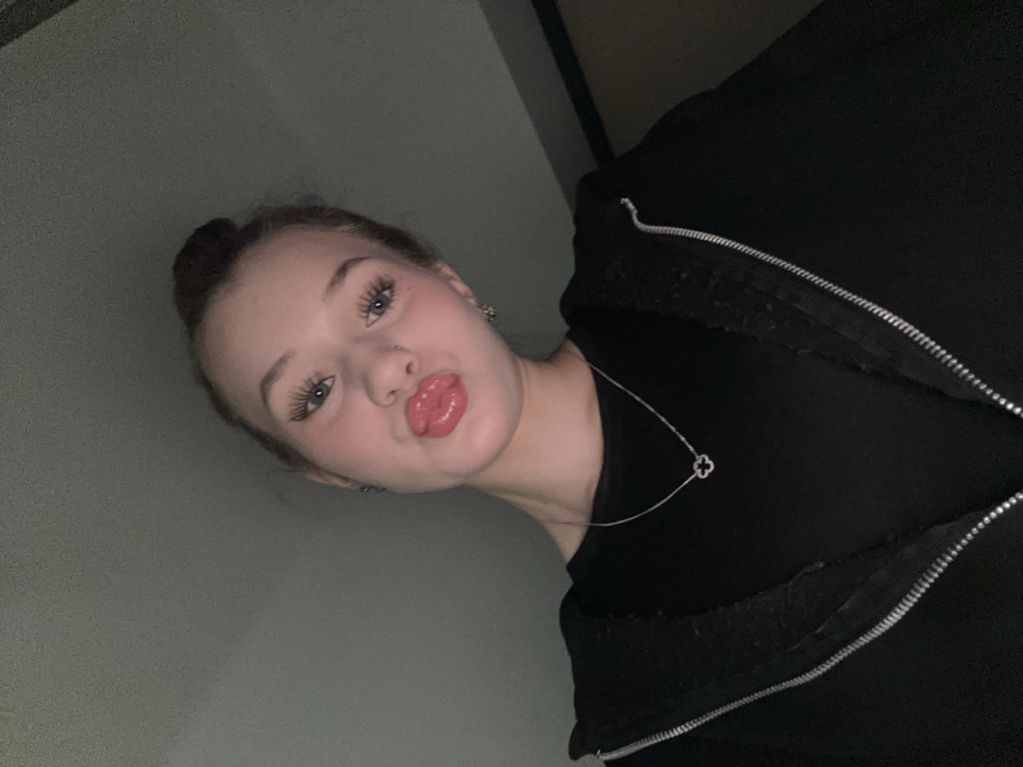 Woman takes multiple selfies at home in Yekaterinburg