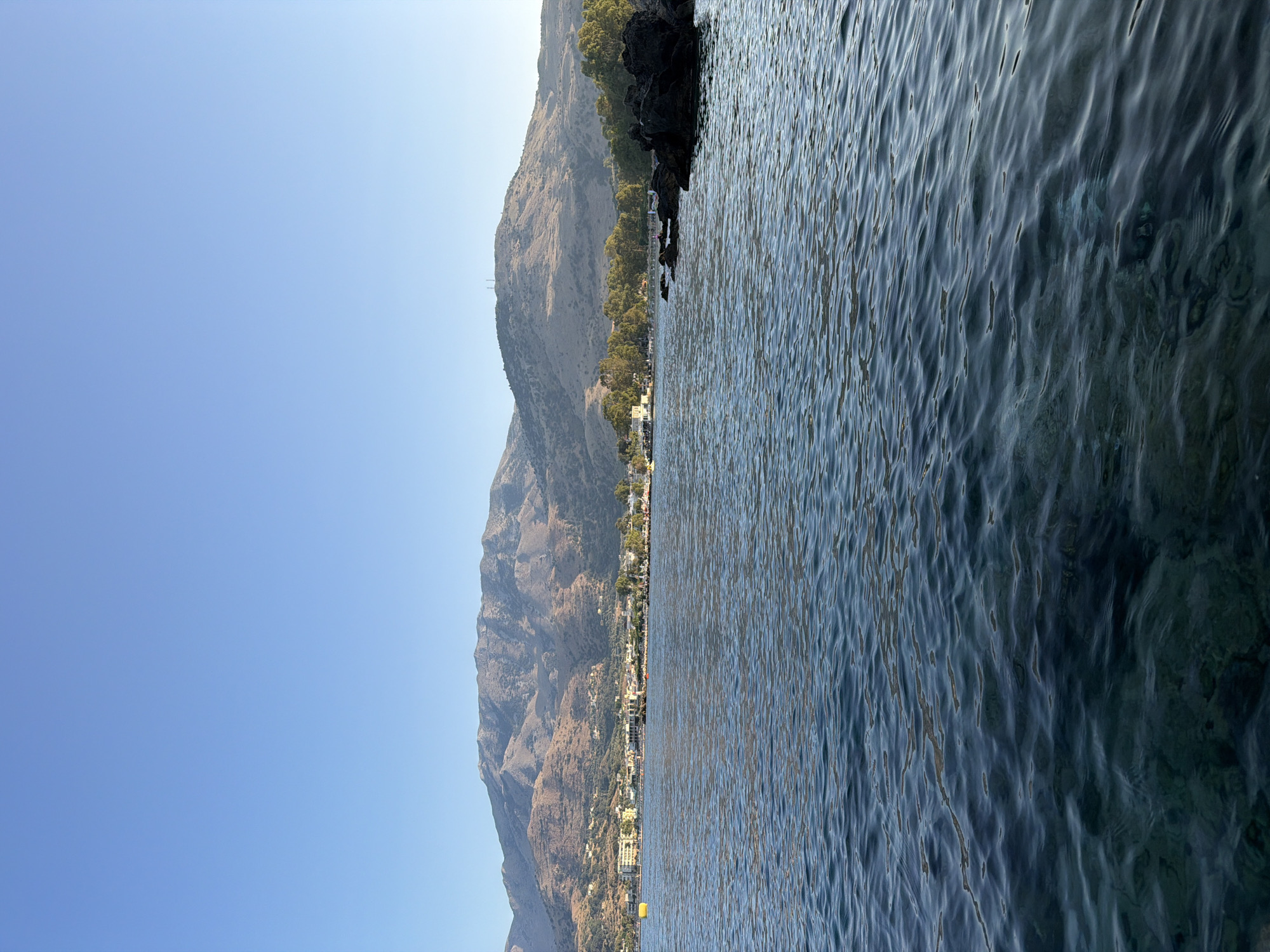Georgioupoli at golden hour: beach, promenade, and town