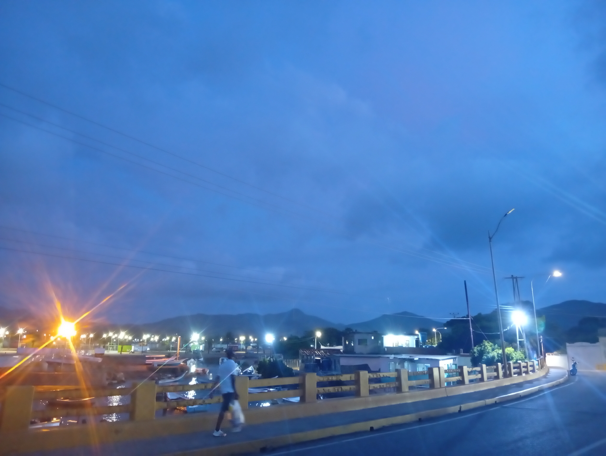 Sunset to nightfall along Juan Griego's waterfront bay