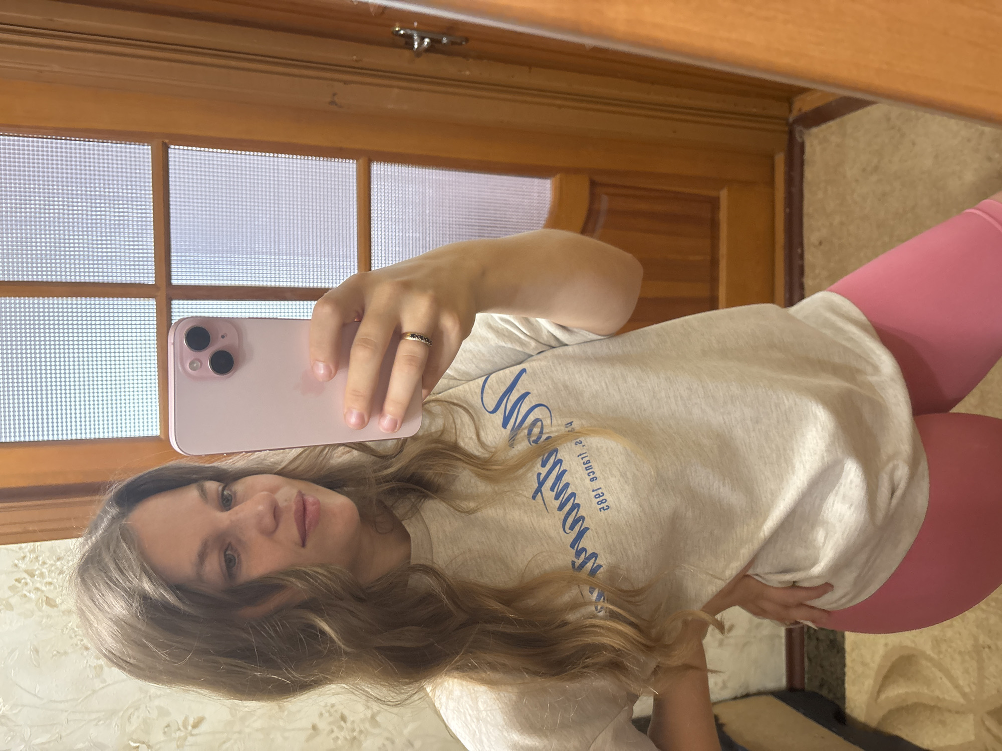 Back-to-back mirror selfies from an indoor spot in Kropyvnytskyi