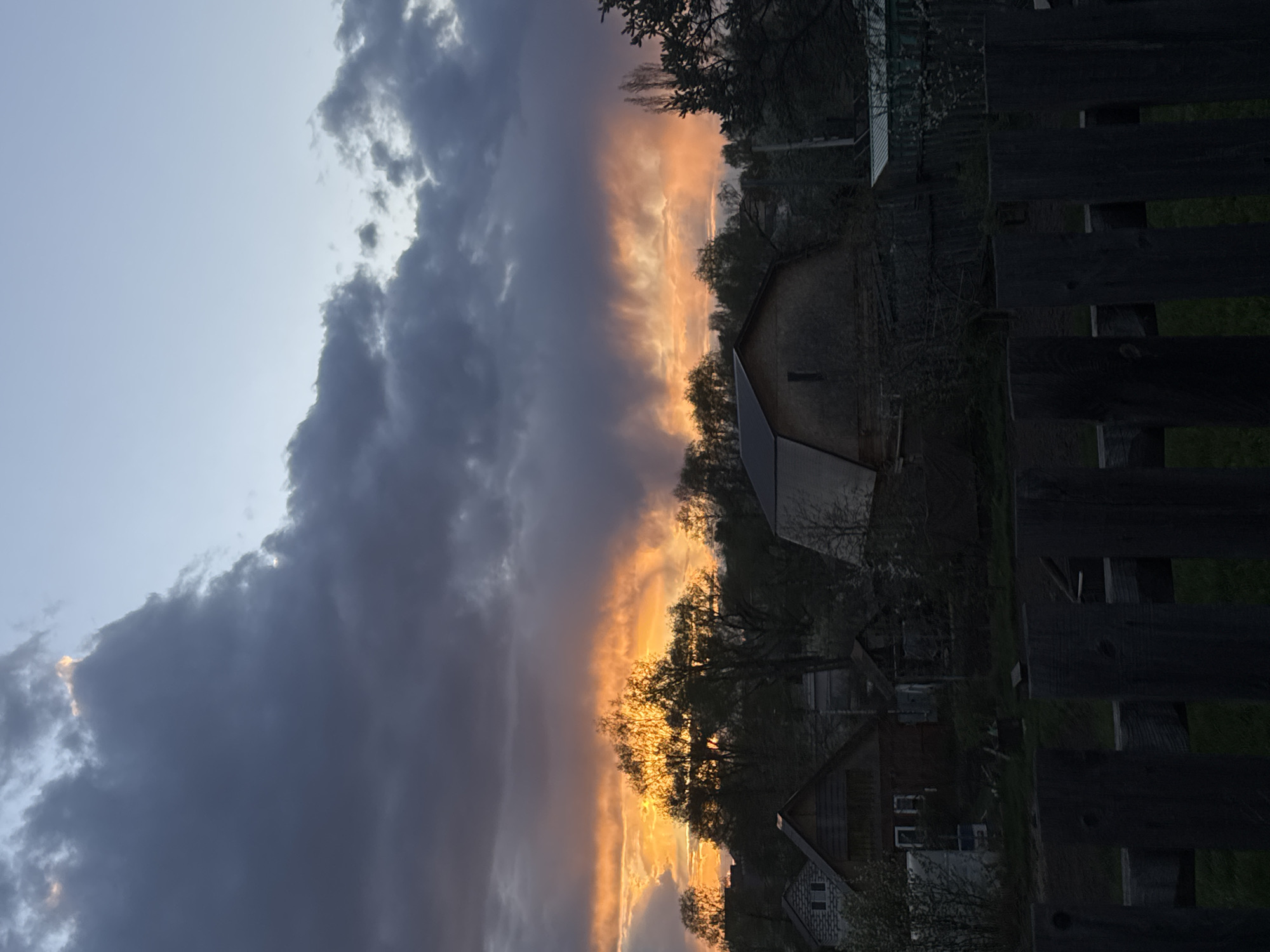 Sunset observed over rural Chaikovsky, Russia residential area