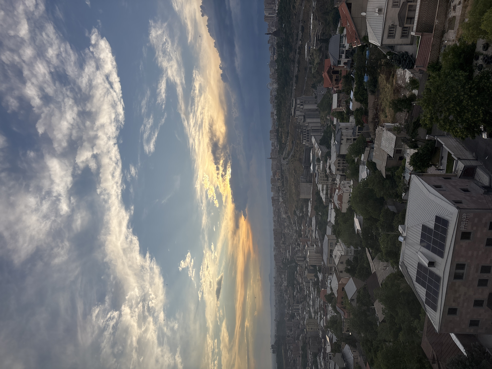 Aerial view captures Yerevan under dramatic cloudy skies