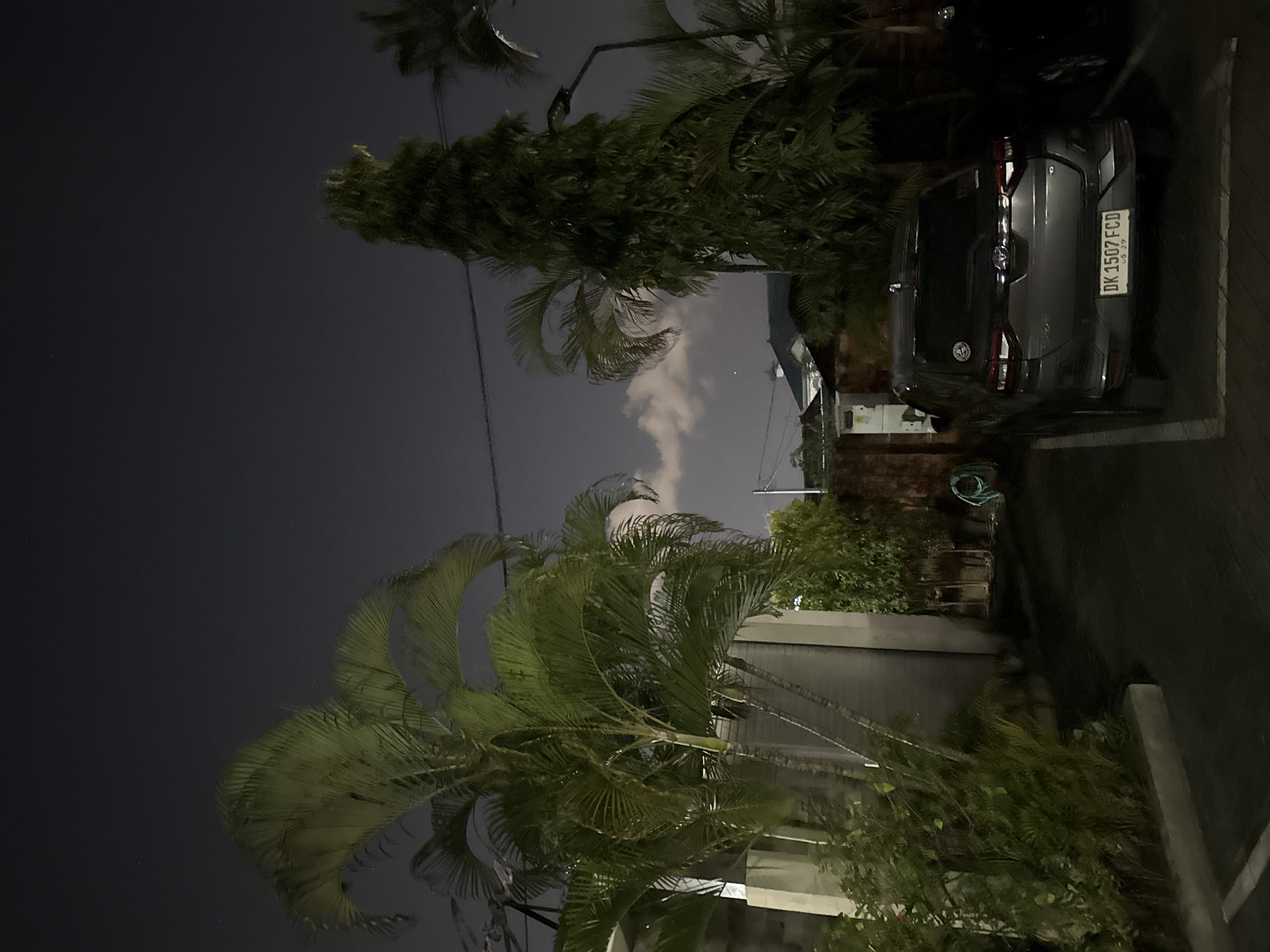 Late-night wander through Denpasar temples, streets, and gardens