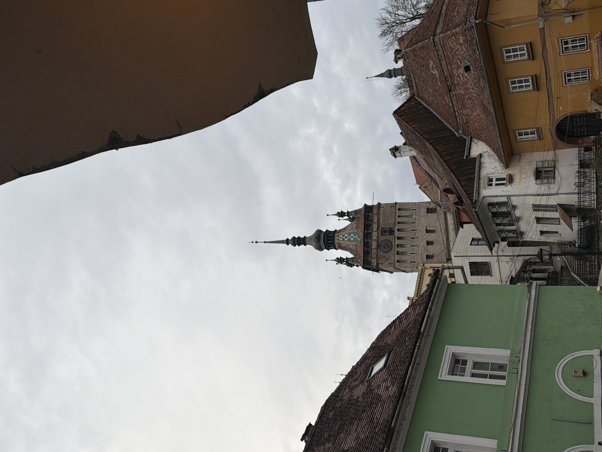 Tourist documents Sighișoara Clock Tower and local architecture details