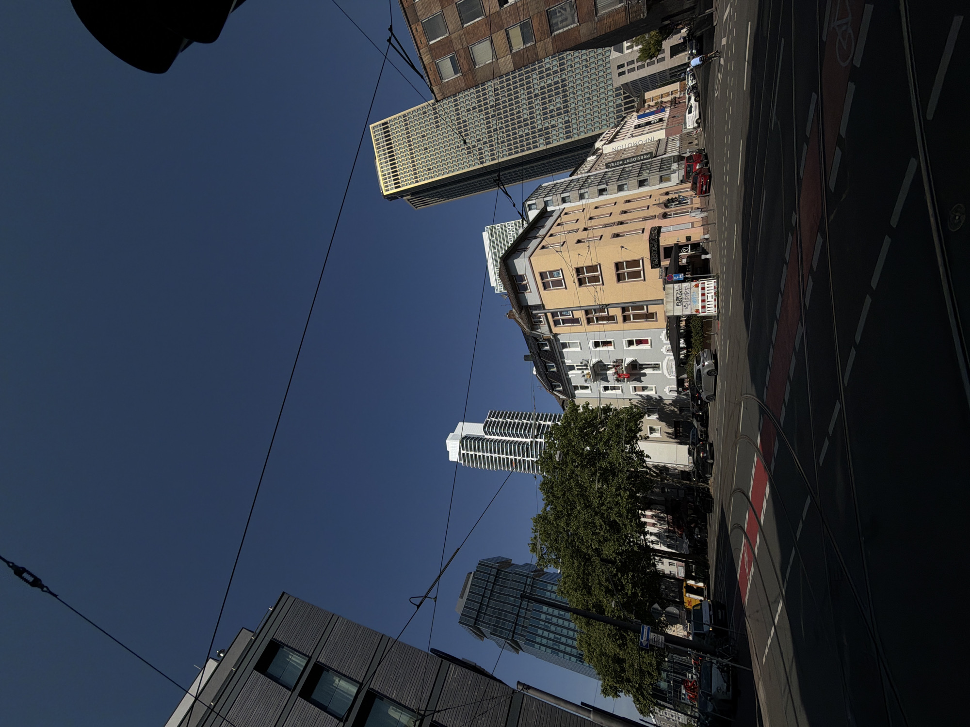 Frankfurt streets on a sunny morning: trams, cafes, and facades