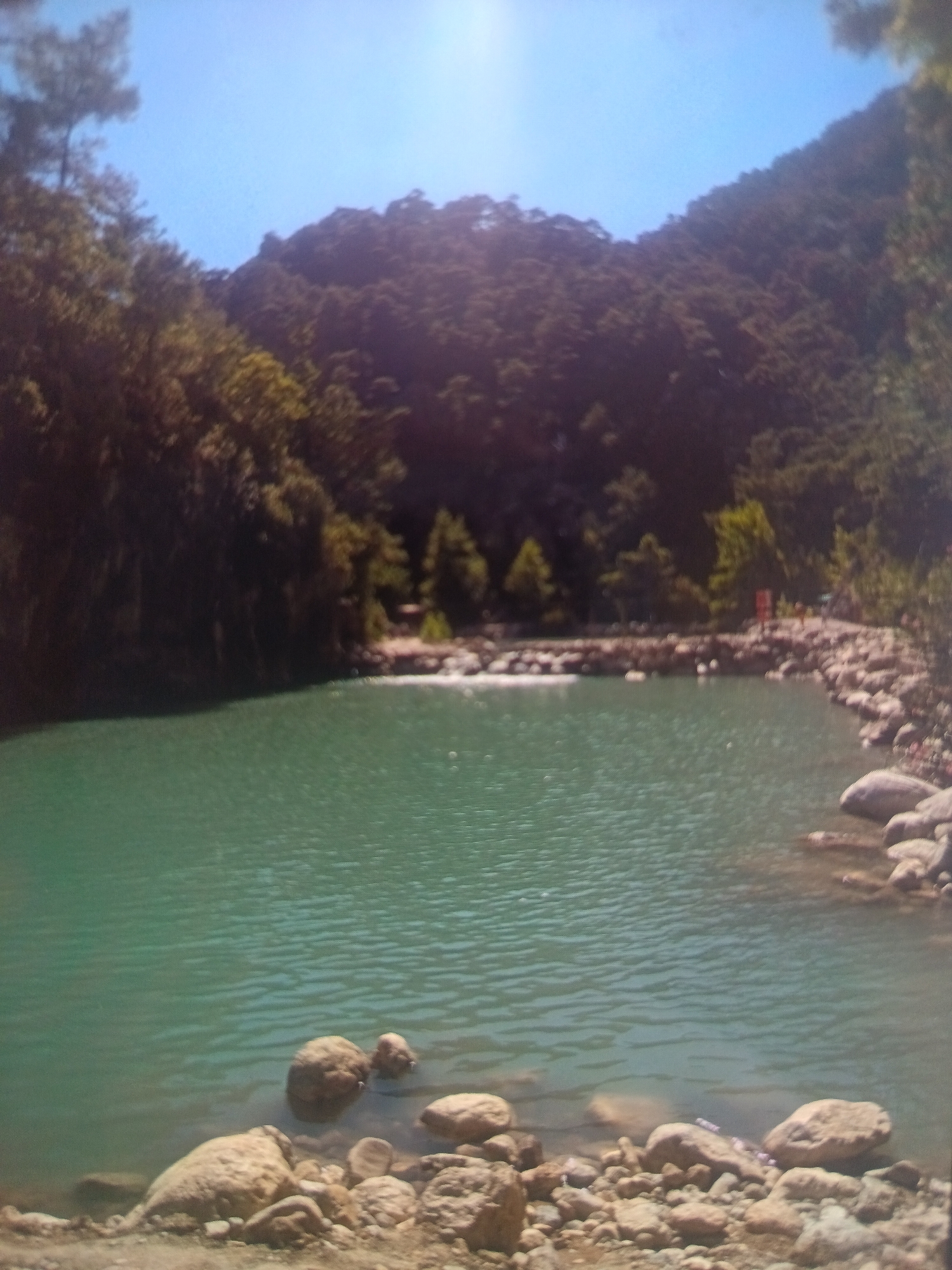 Turquoise river flows through Armenian mountain landscape near Nor Geghi