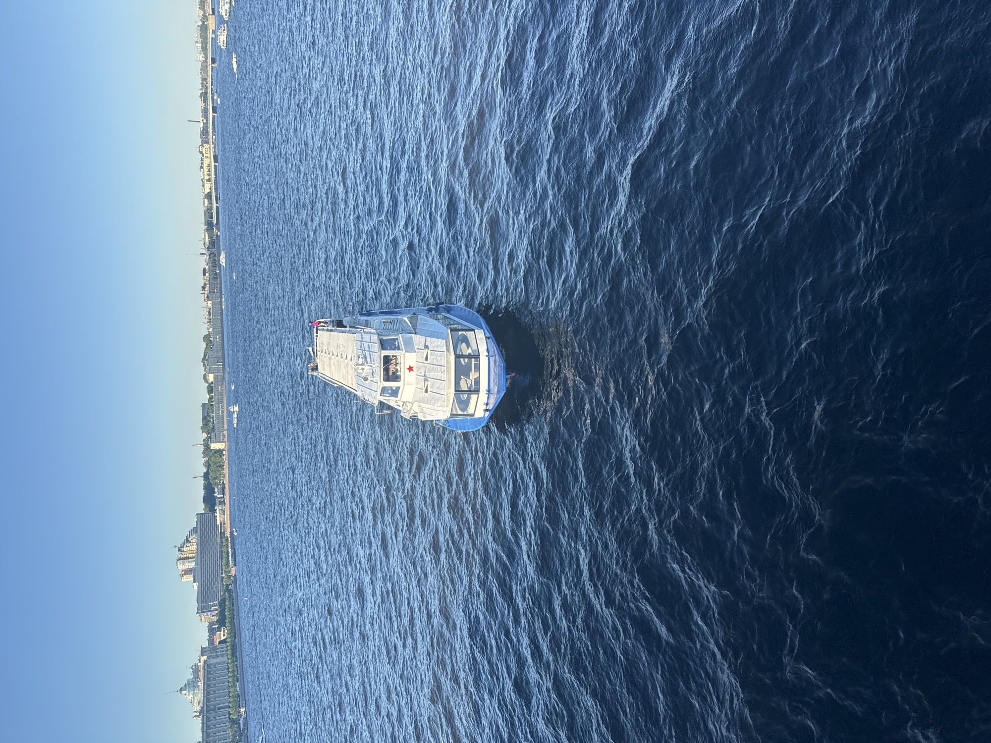 Saint Petersburg landmarks and Neva riverfront on a sunny June evening