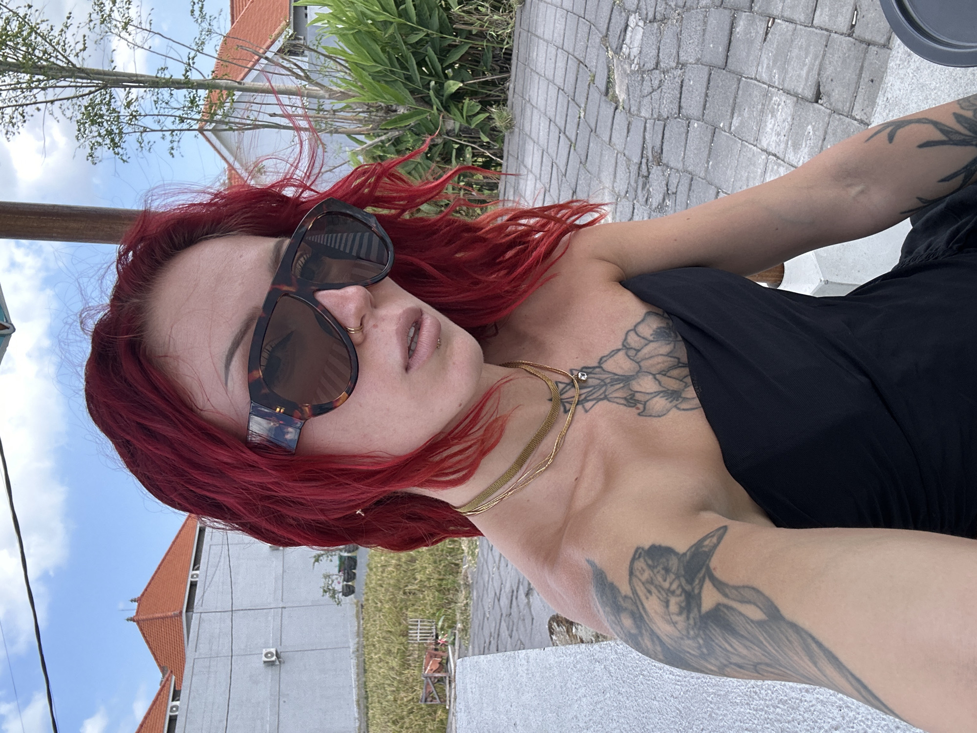 Red-haired woman photographed at North Kuta resort setting