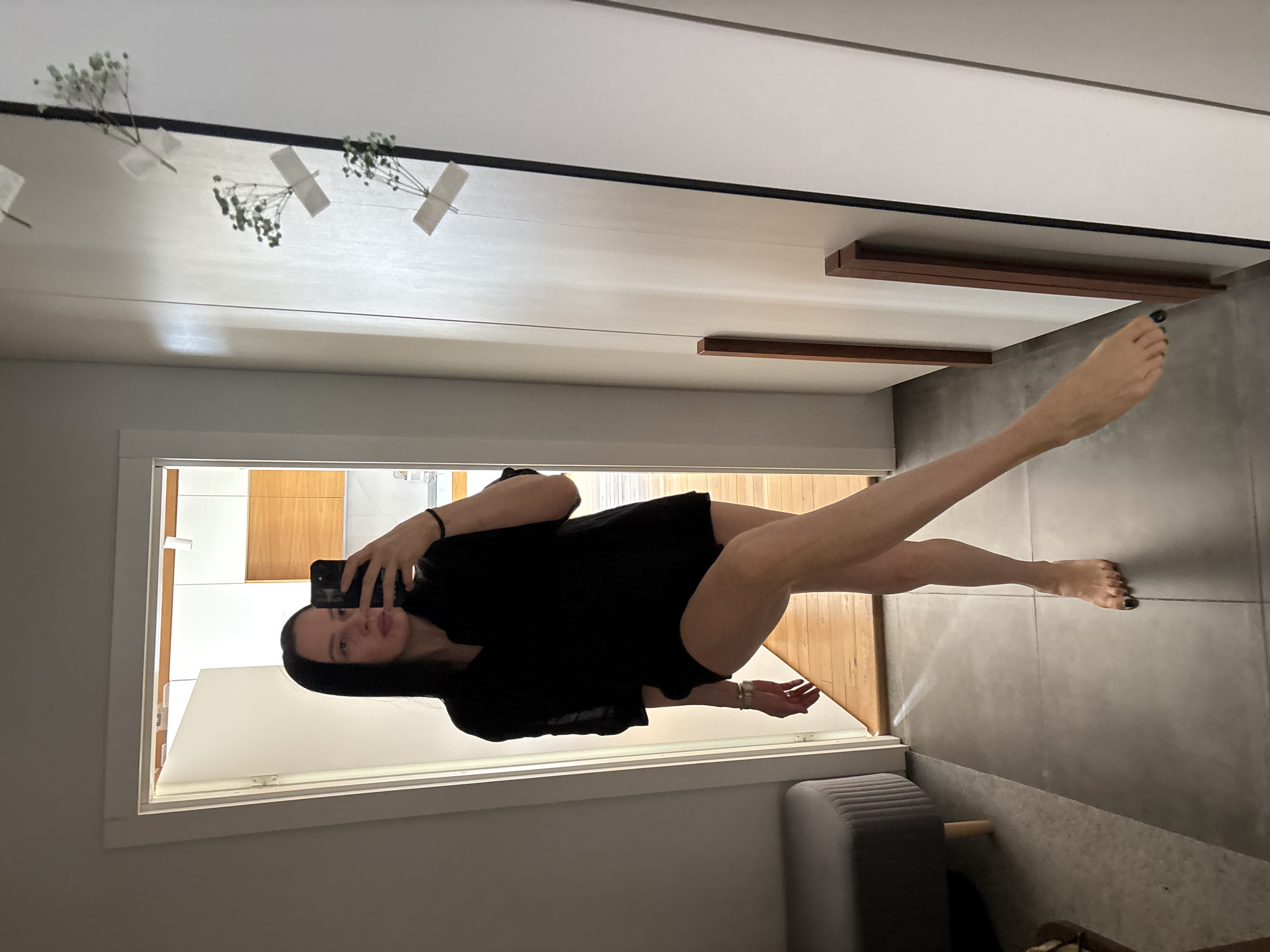 Woman takes selfies with sunflowers in Chaikovsky morning routine