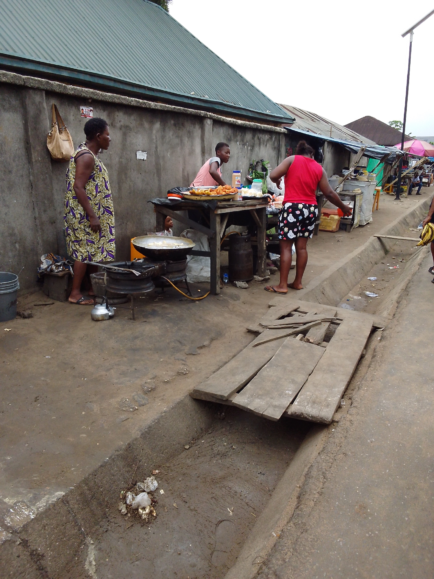 Morning street life and market activity observed in Aba Nigeria