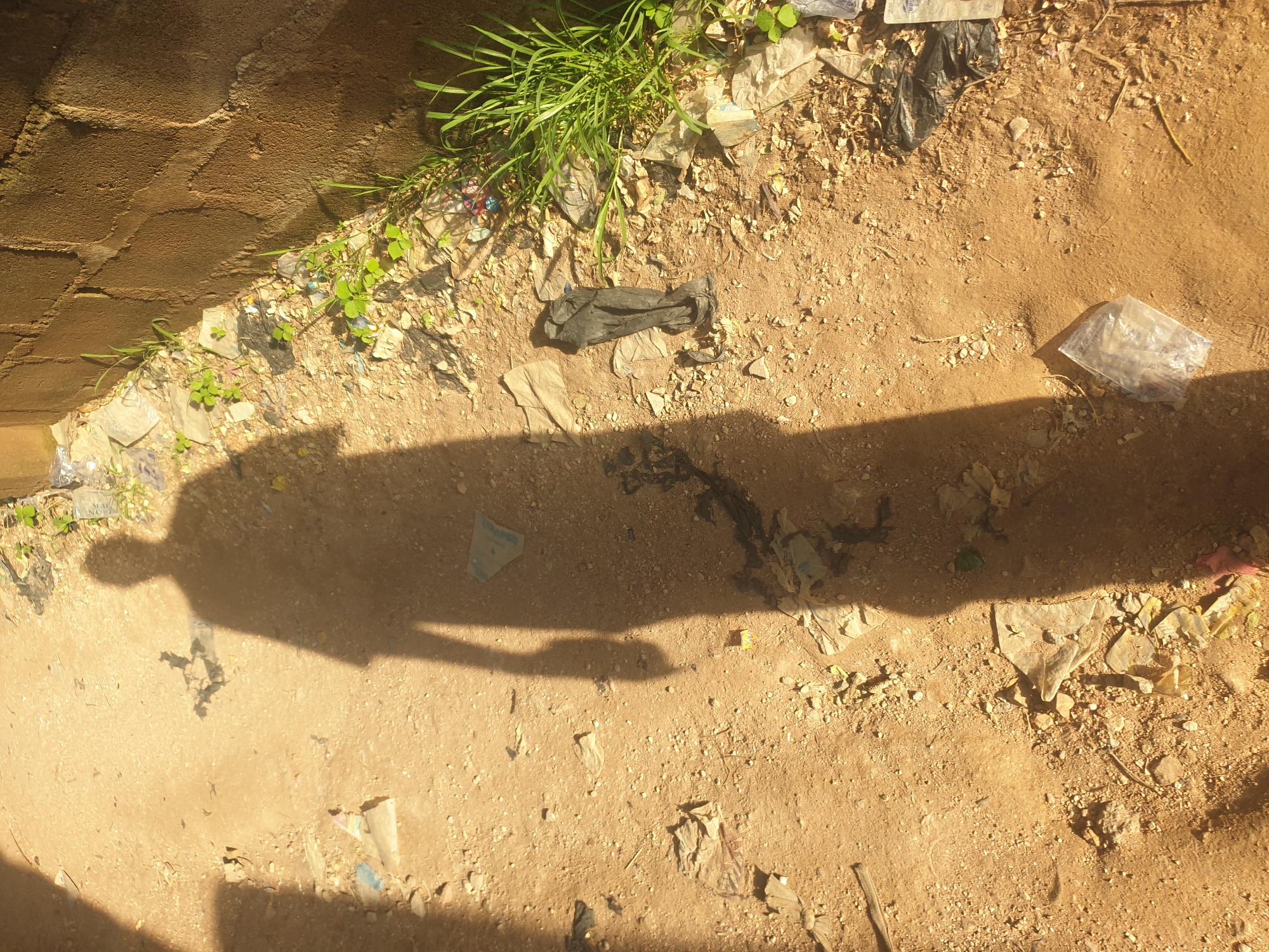Witness documents debris, burnt objects, household items across unknown location