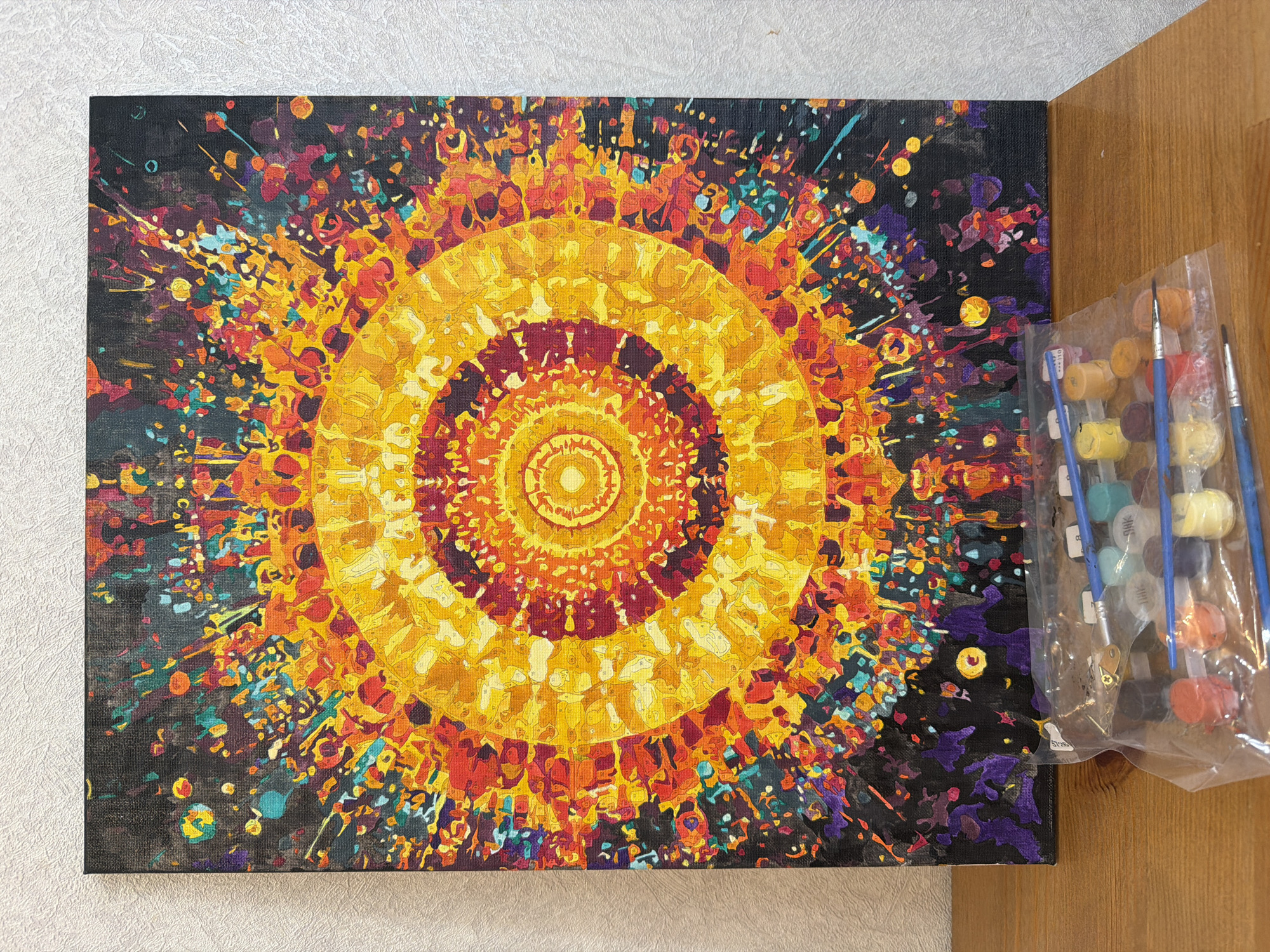 Paint-by-numbers sun artwork completed in Russian village