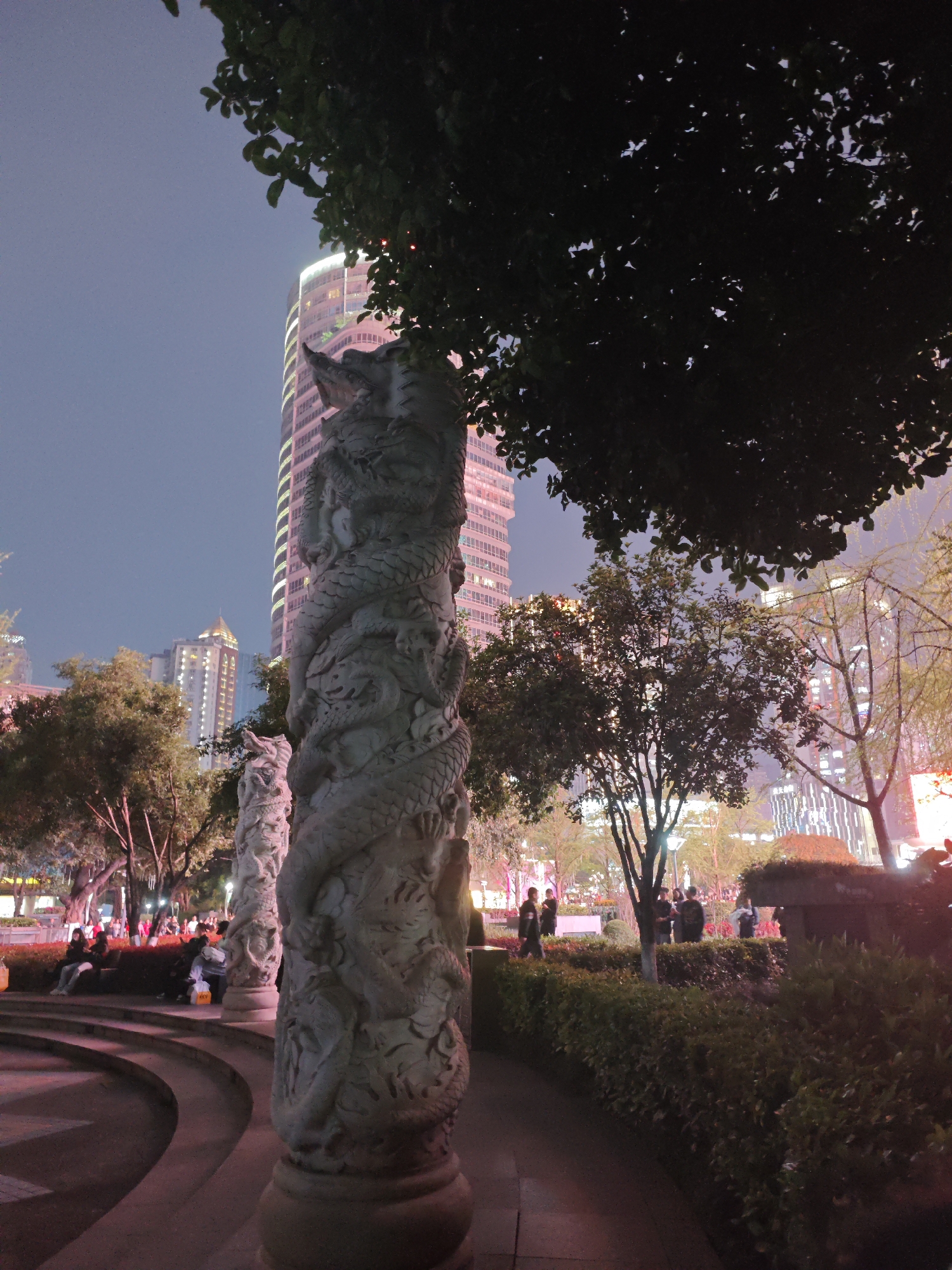 Evening park activity captured in urban Liangjiang setting