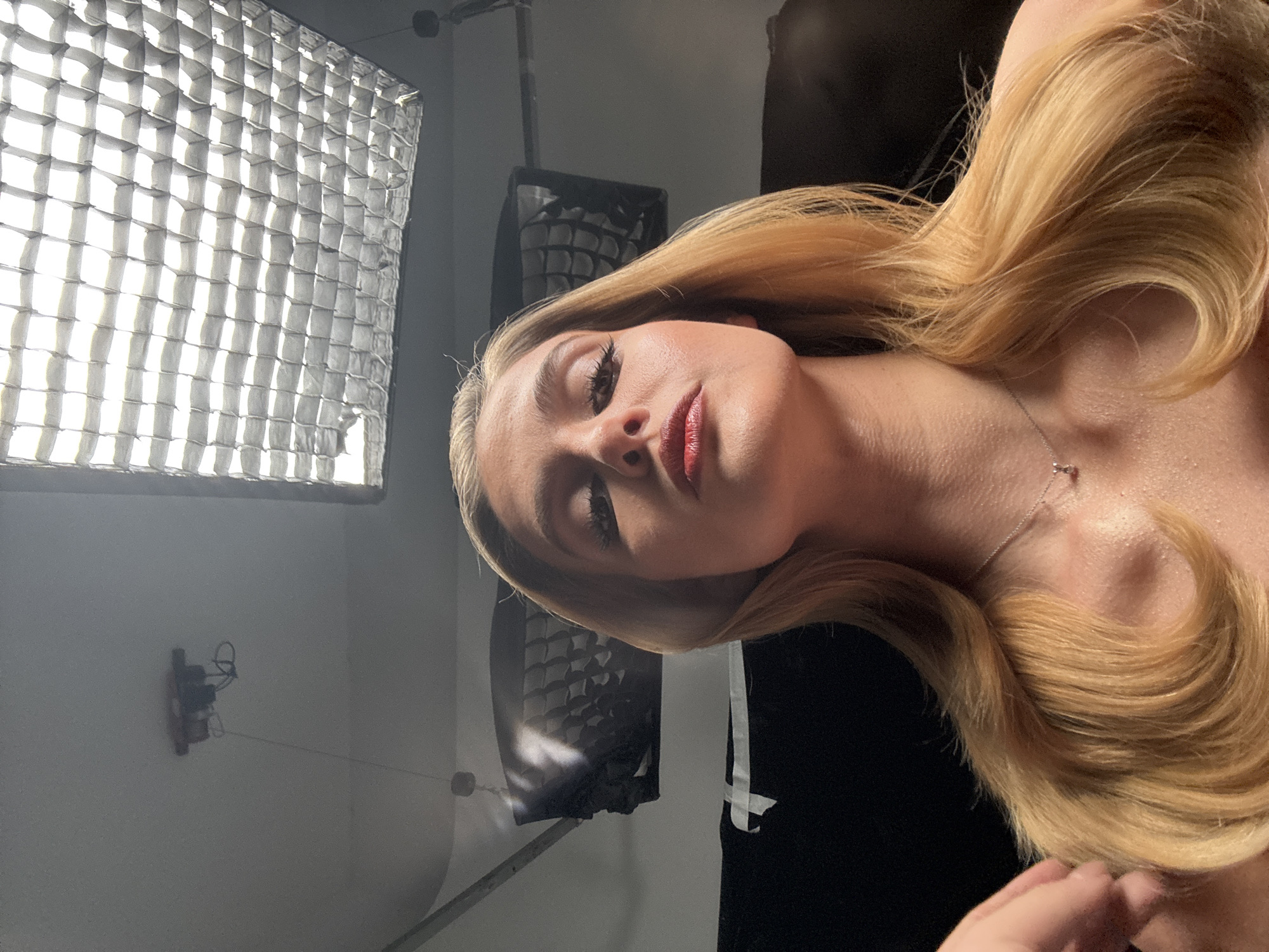 Portrait photoshoot captured in Tbilisi studio featuring blonde woman