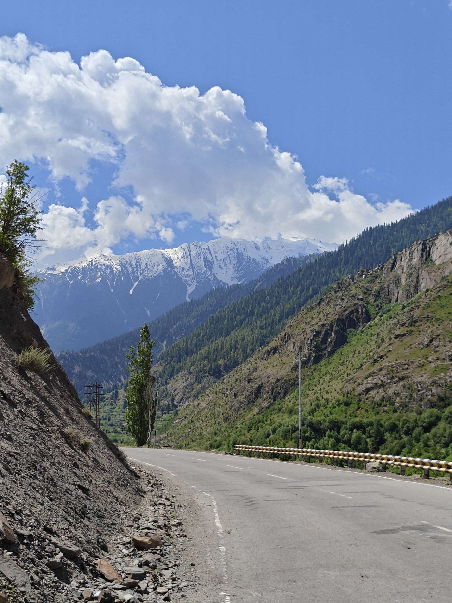 Remote Himalayan village, mountain roads, and a damaged bridge in Kishorl