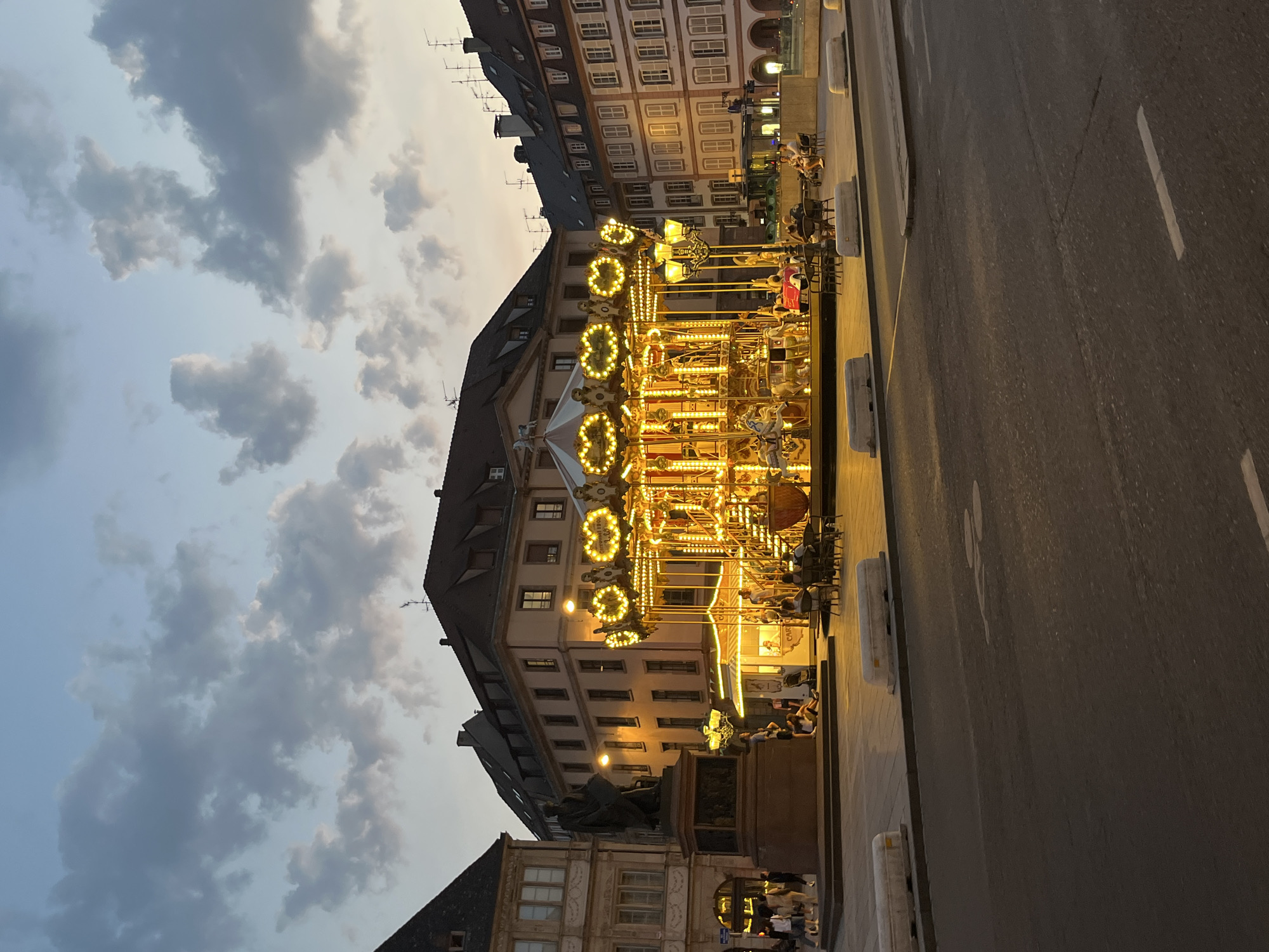 Carousel lights up Place Kléber on a Strasbourg summer evening