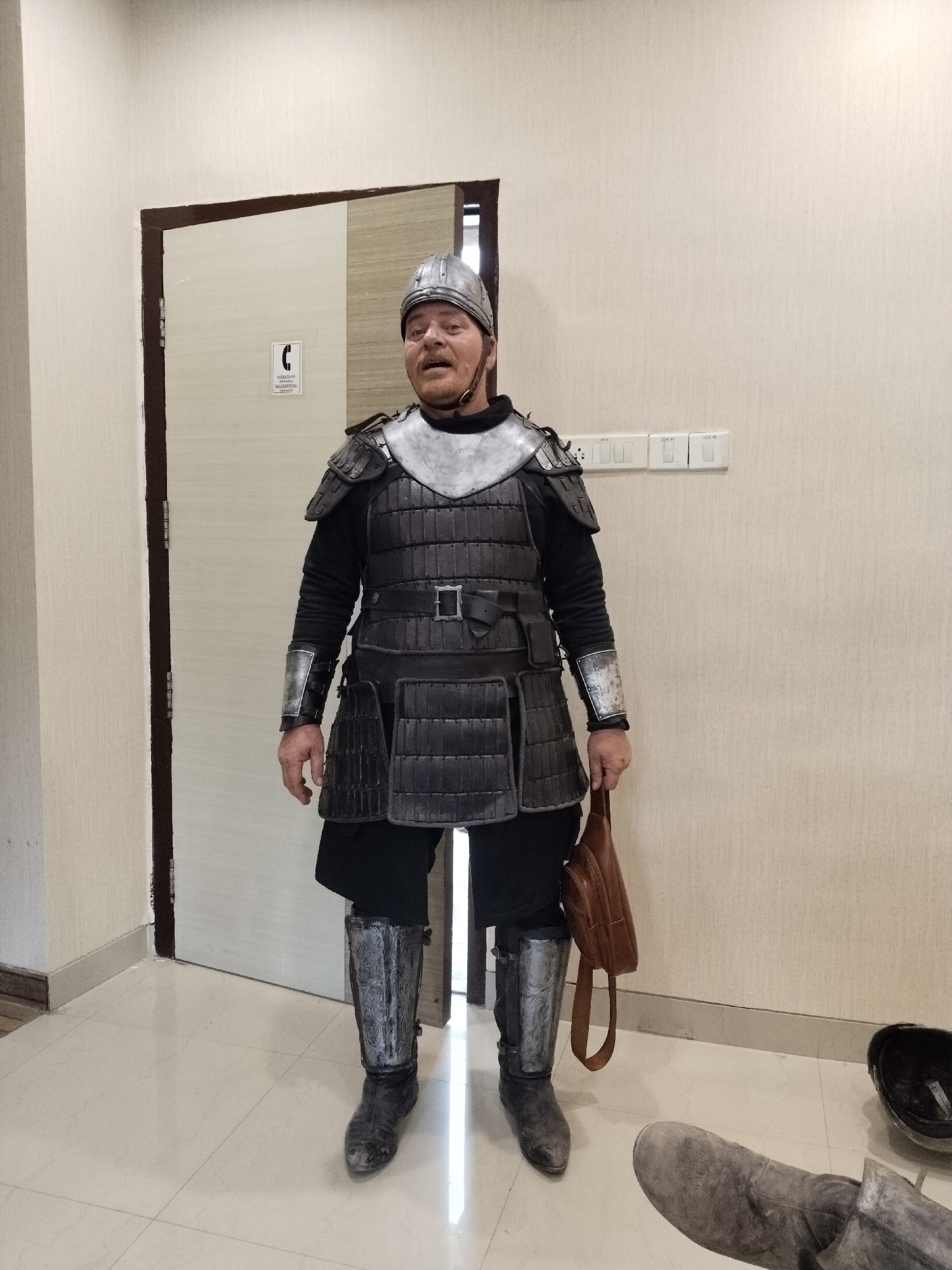 Person spotted wearing medieval-style armor indoors