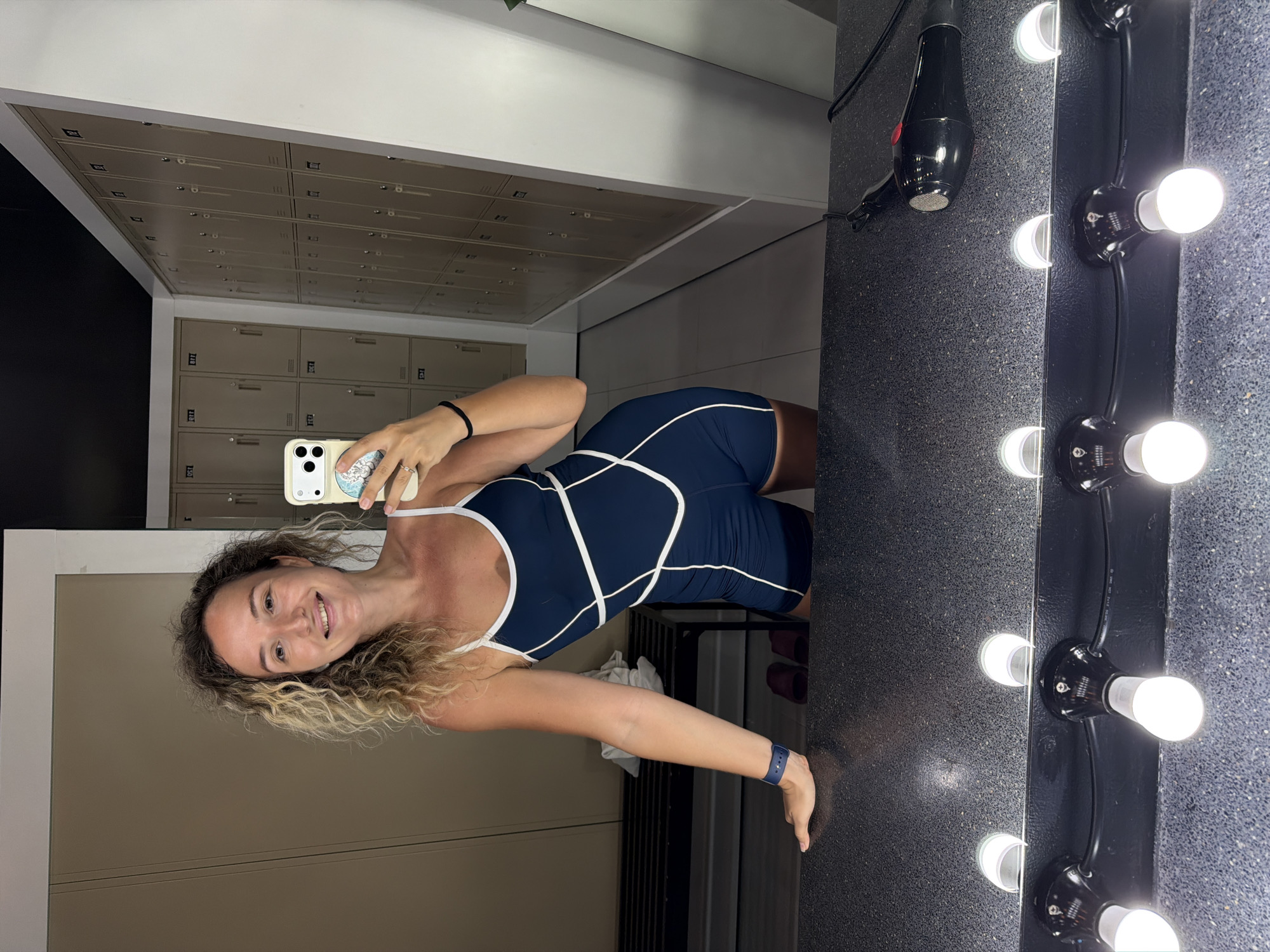 Locker room selfies and quick outfit checks in Choeng Mon