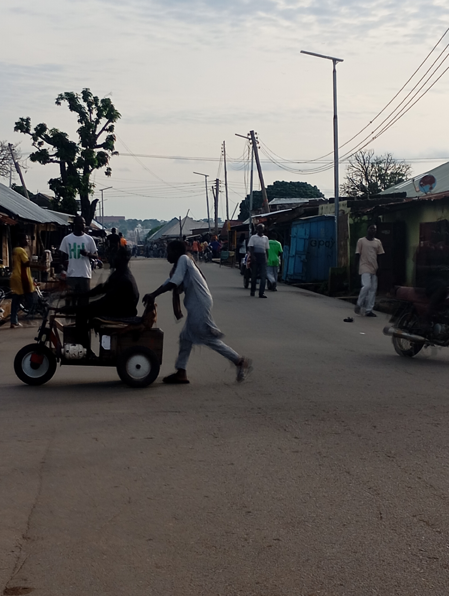 Everyday street traffic and commerce in Shendam, Nigeria