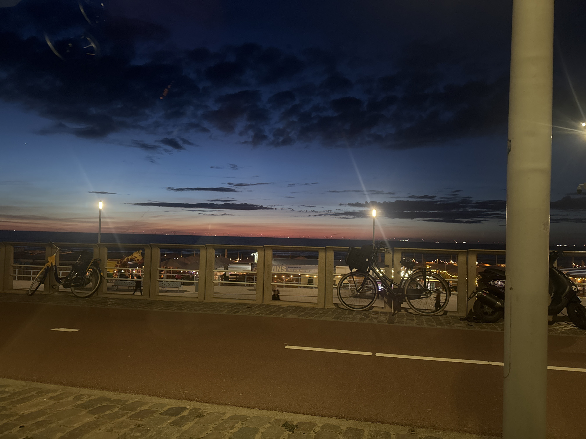 Dusk scene documented near The Hague beach with cloudy skies