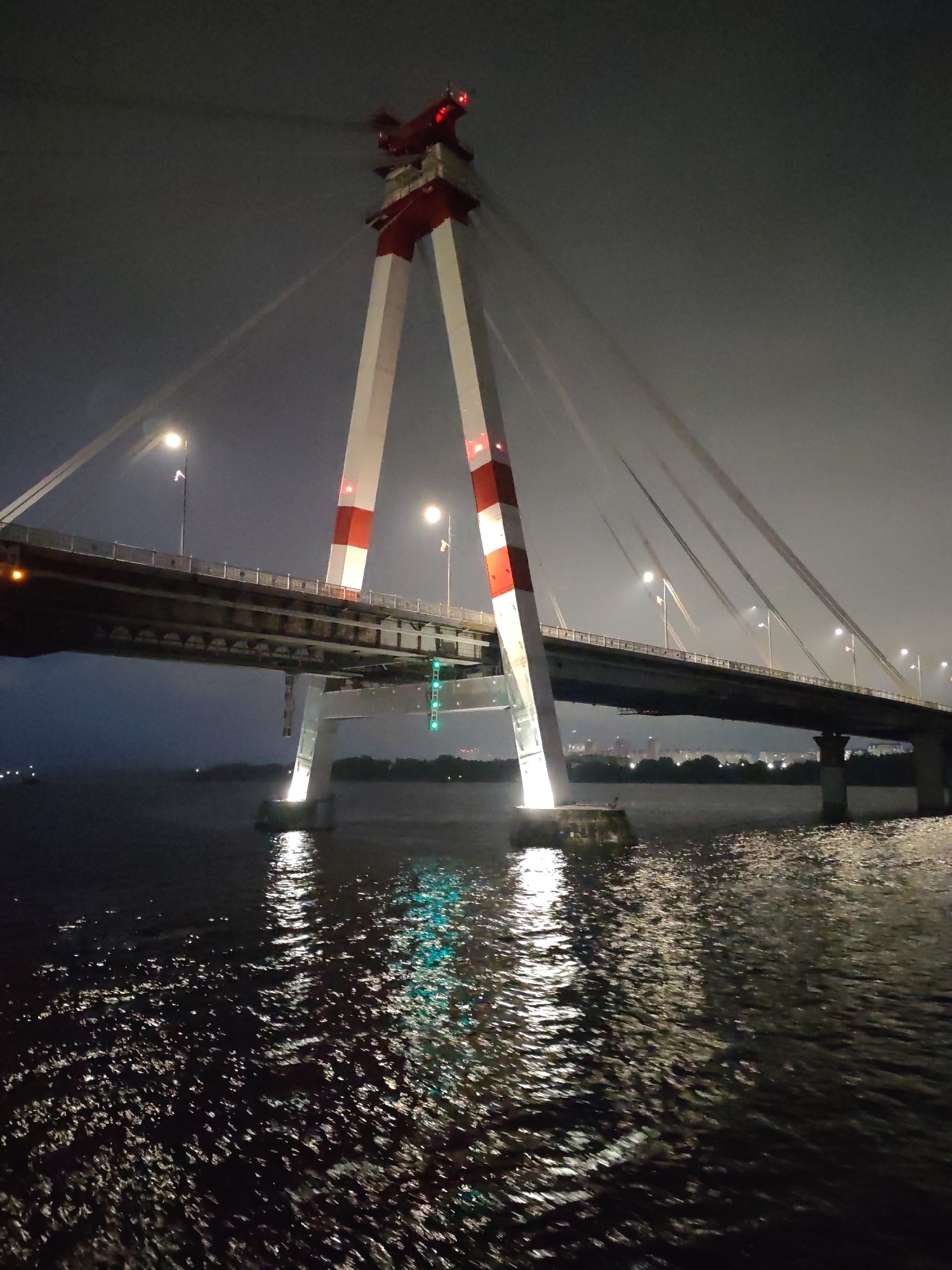 October Bridge illuminated at night in Cherepovets, Russia
