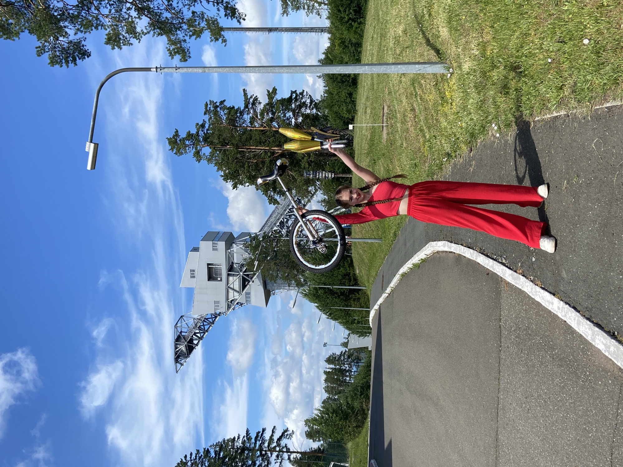 Juggler and unicyclist at a street performance in Прикамский