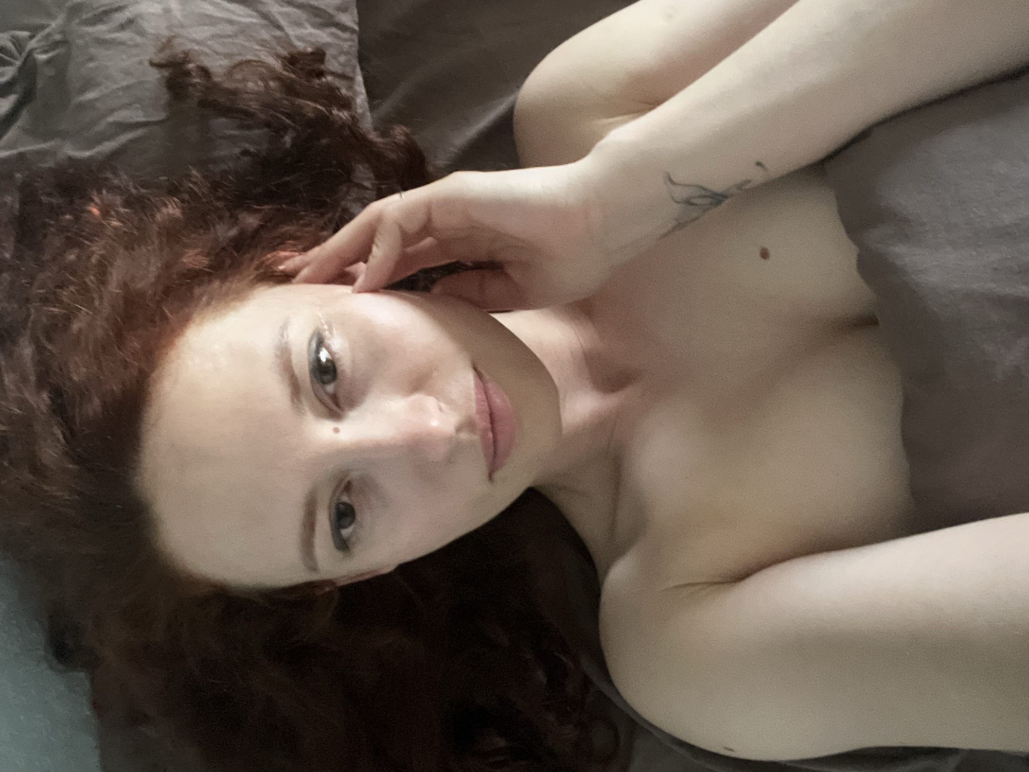 Person with red hair observed lying in bed in Saint Petersburg