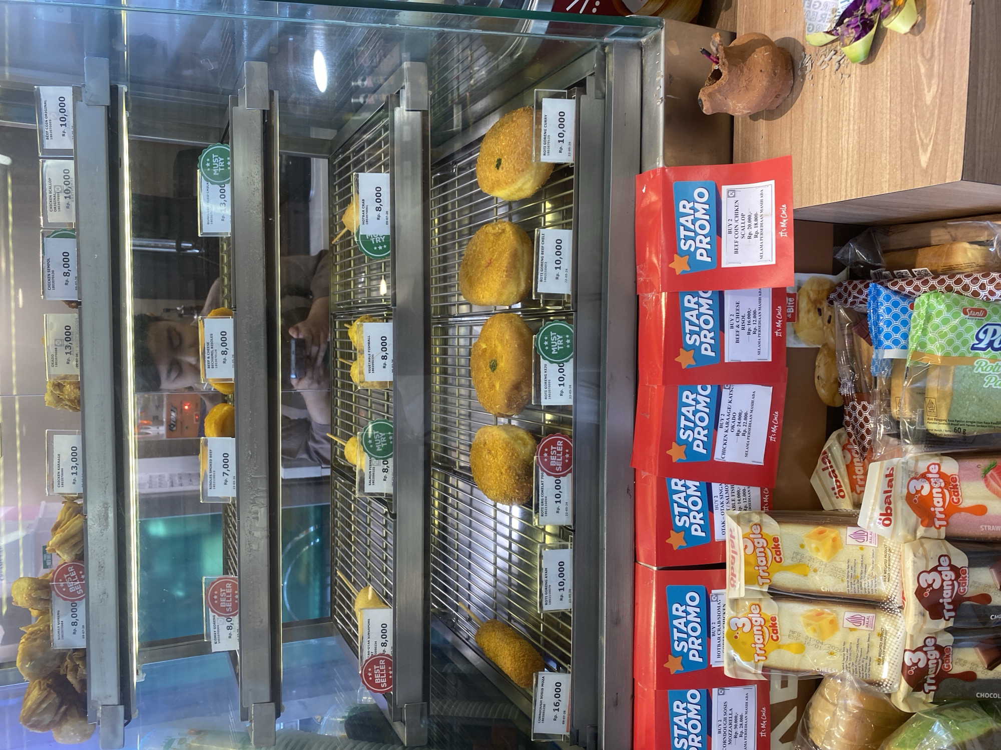 Quick stop at a North Kuta Circle K, tourist strip surroundings