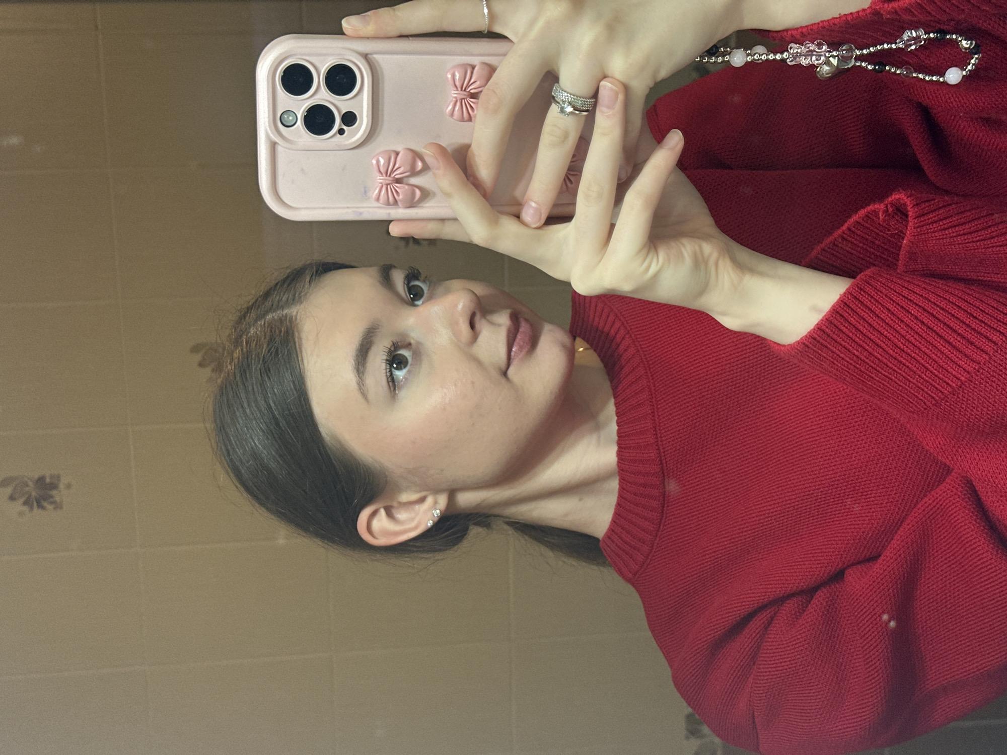 Young woman documents personal belongings, takes selfies in Kazan home