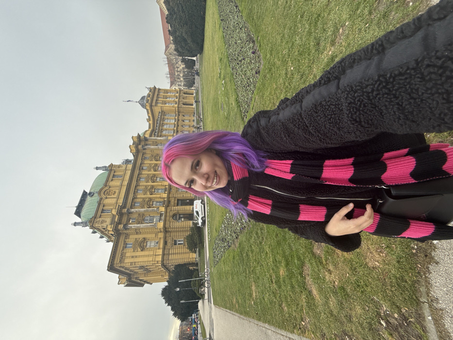 Colorful-haired tourist explores Zagreb's historic center on Saturday afternoon