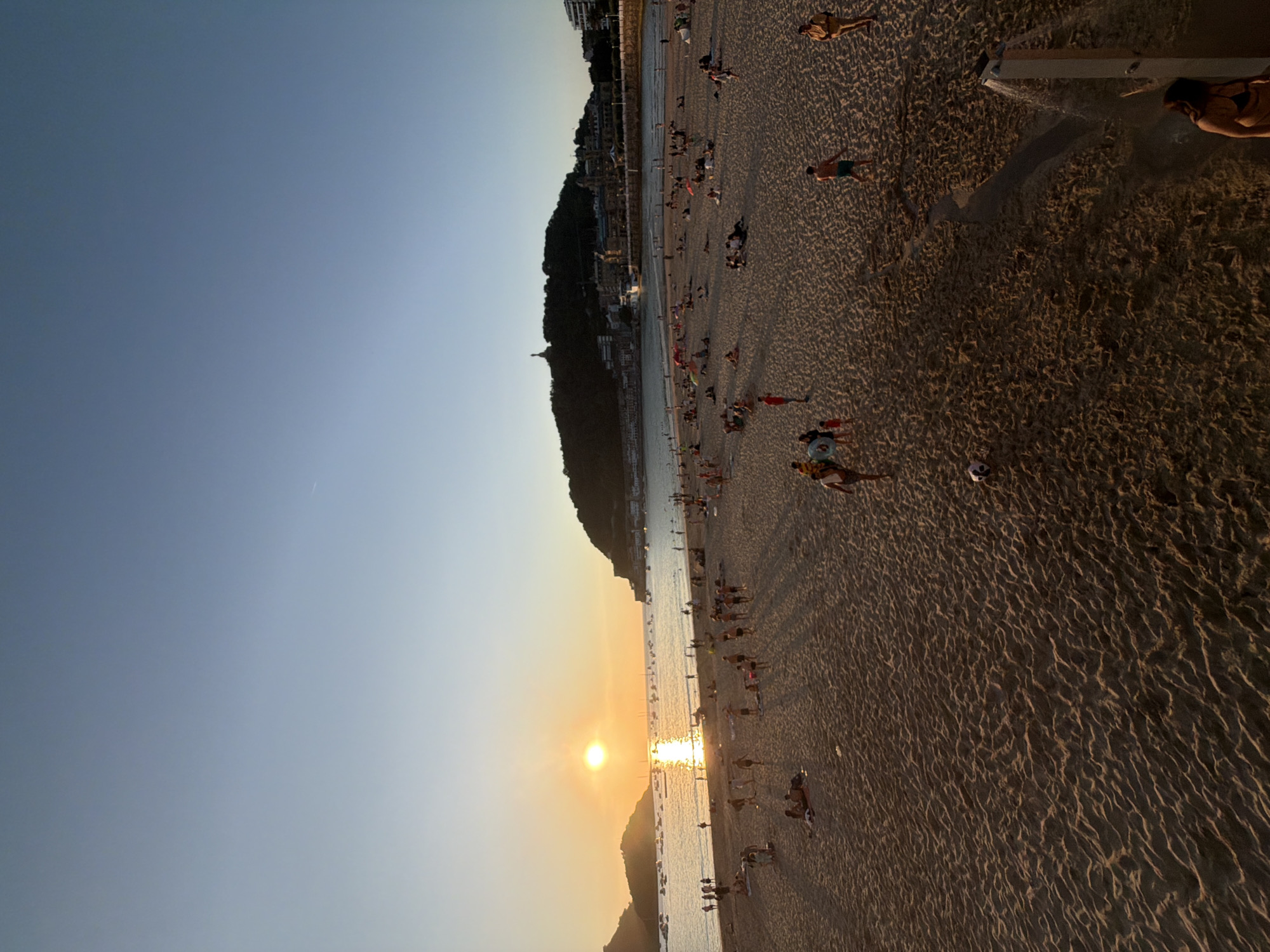 Sunset crowd fills La Concha Beach and promenade in San Sebastián
