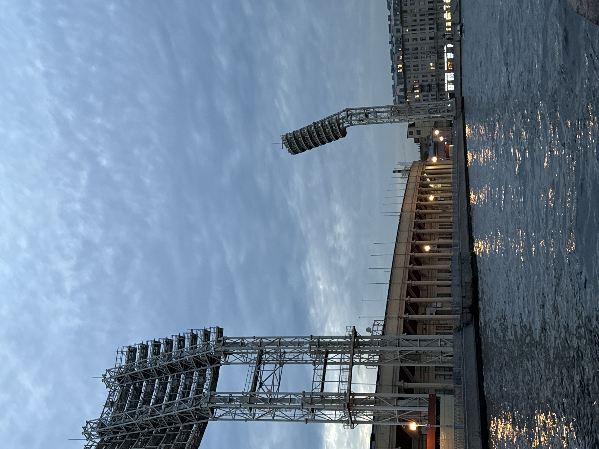Petrovsky Stadium seen from the river, motorboat passing by