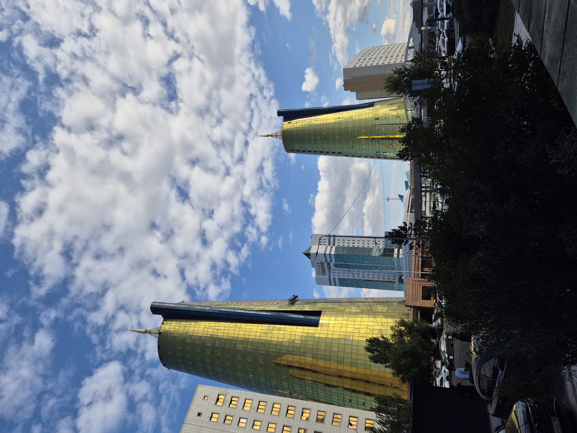 Astana city streets, landmarks, and a café visit