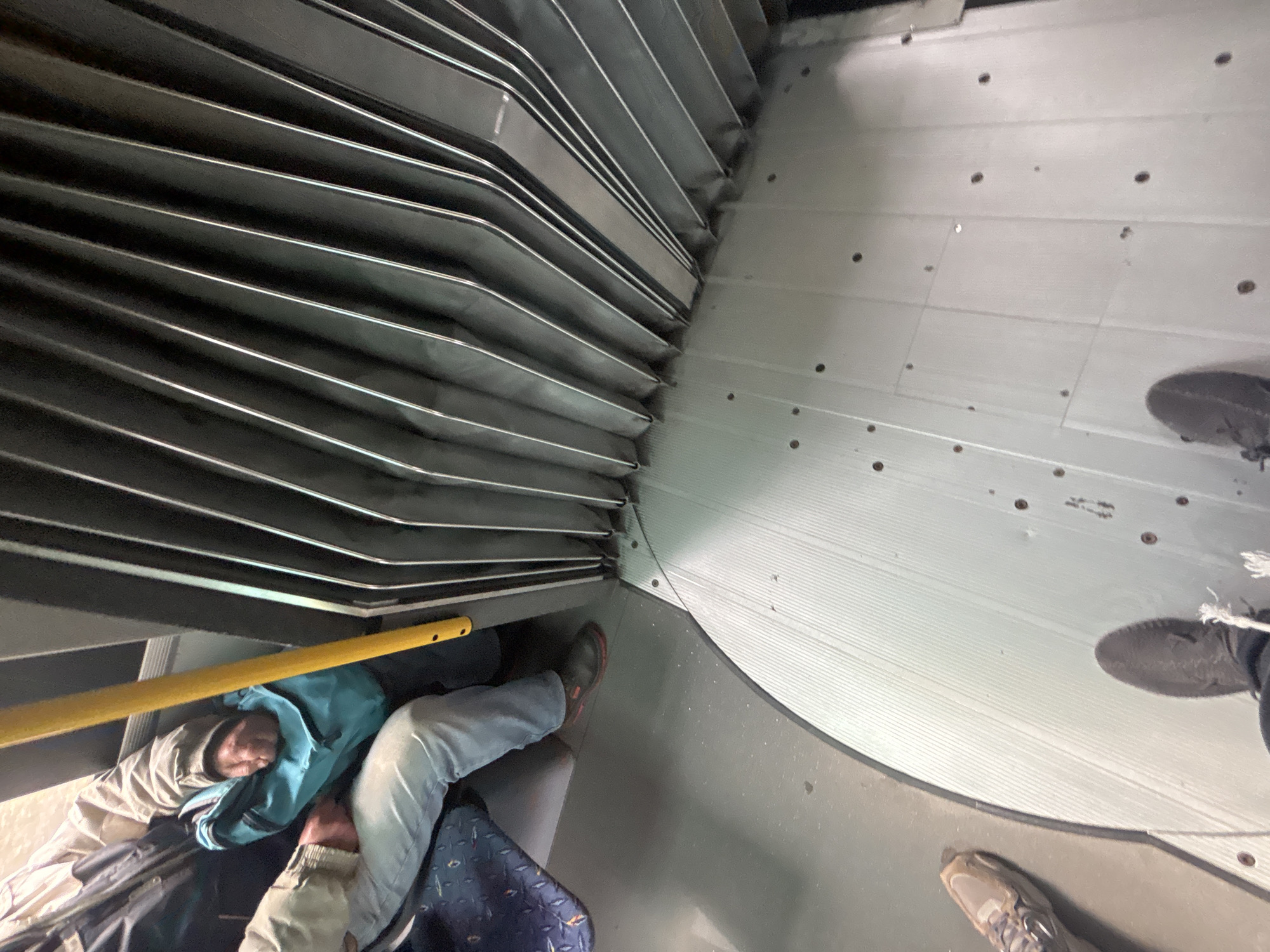 Passenger sleeps under luggage rack on Burgas bus