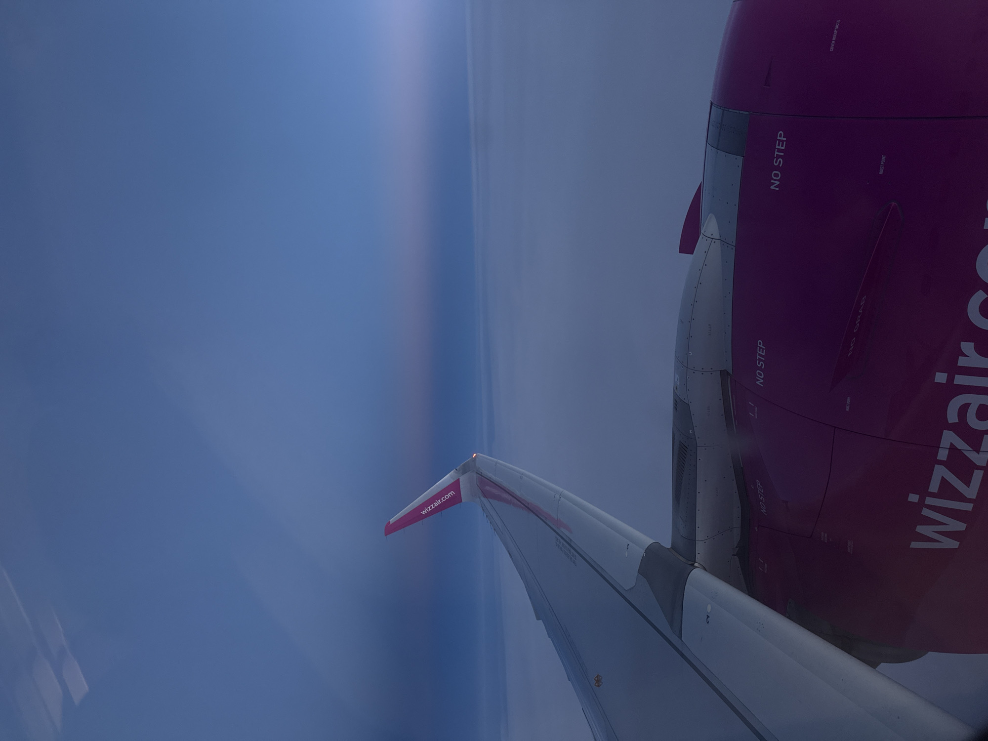 Passenger photographs Wizzair wing during flight over Turkey