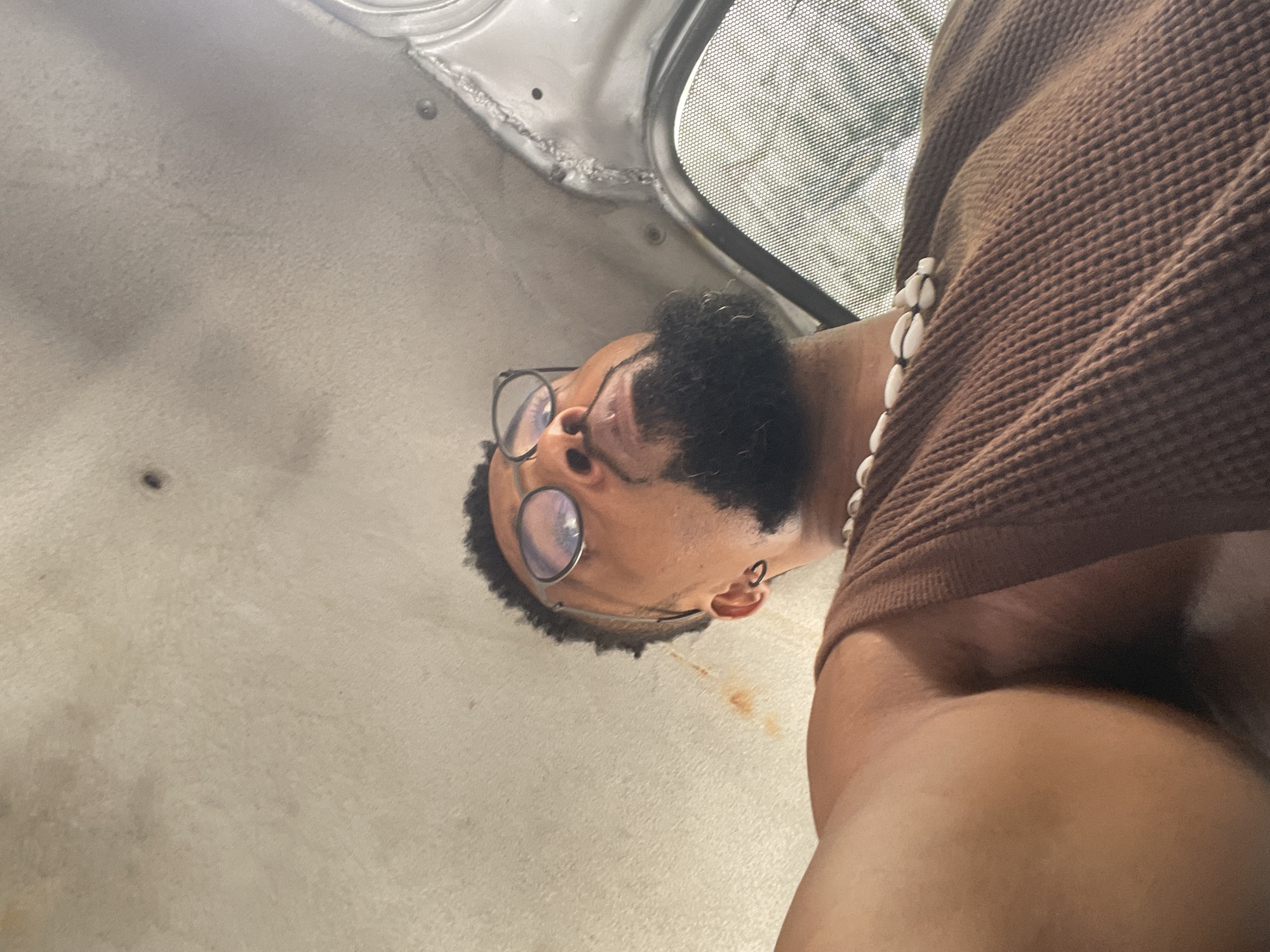 Young men captured in casual moments across Lagos streets