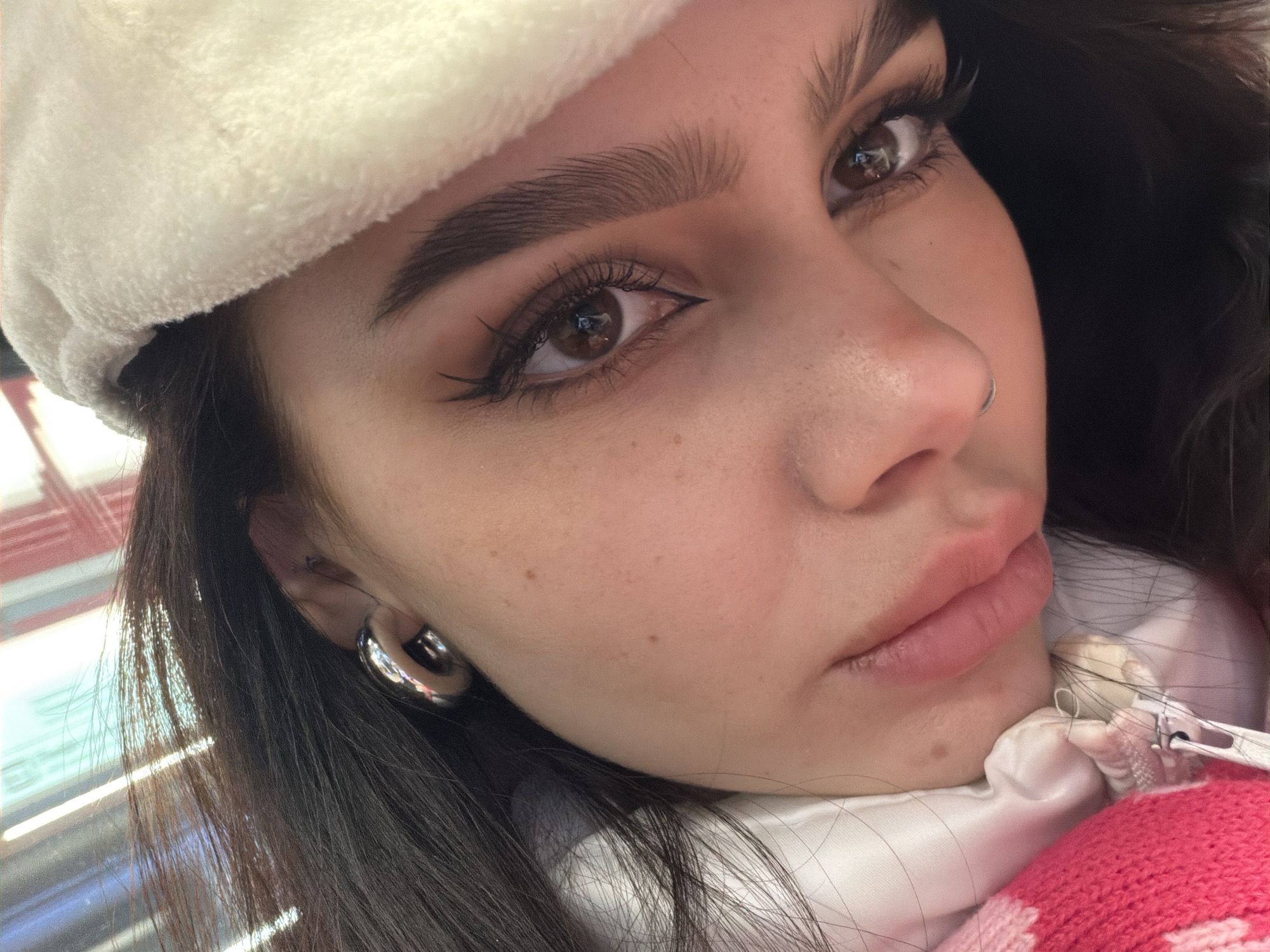 Woman in white hat photographed in Moscow