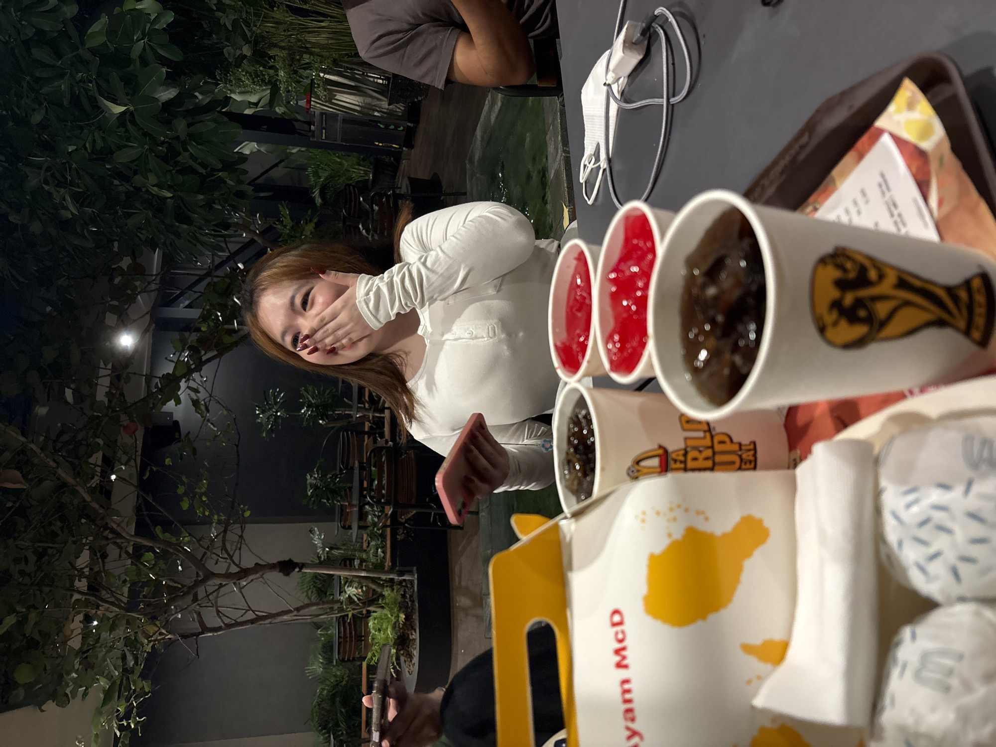 Late-night McDonald's hangout in North Jakarta with FIFA-branded drinks