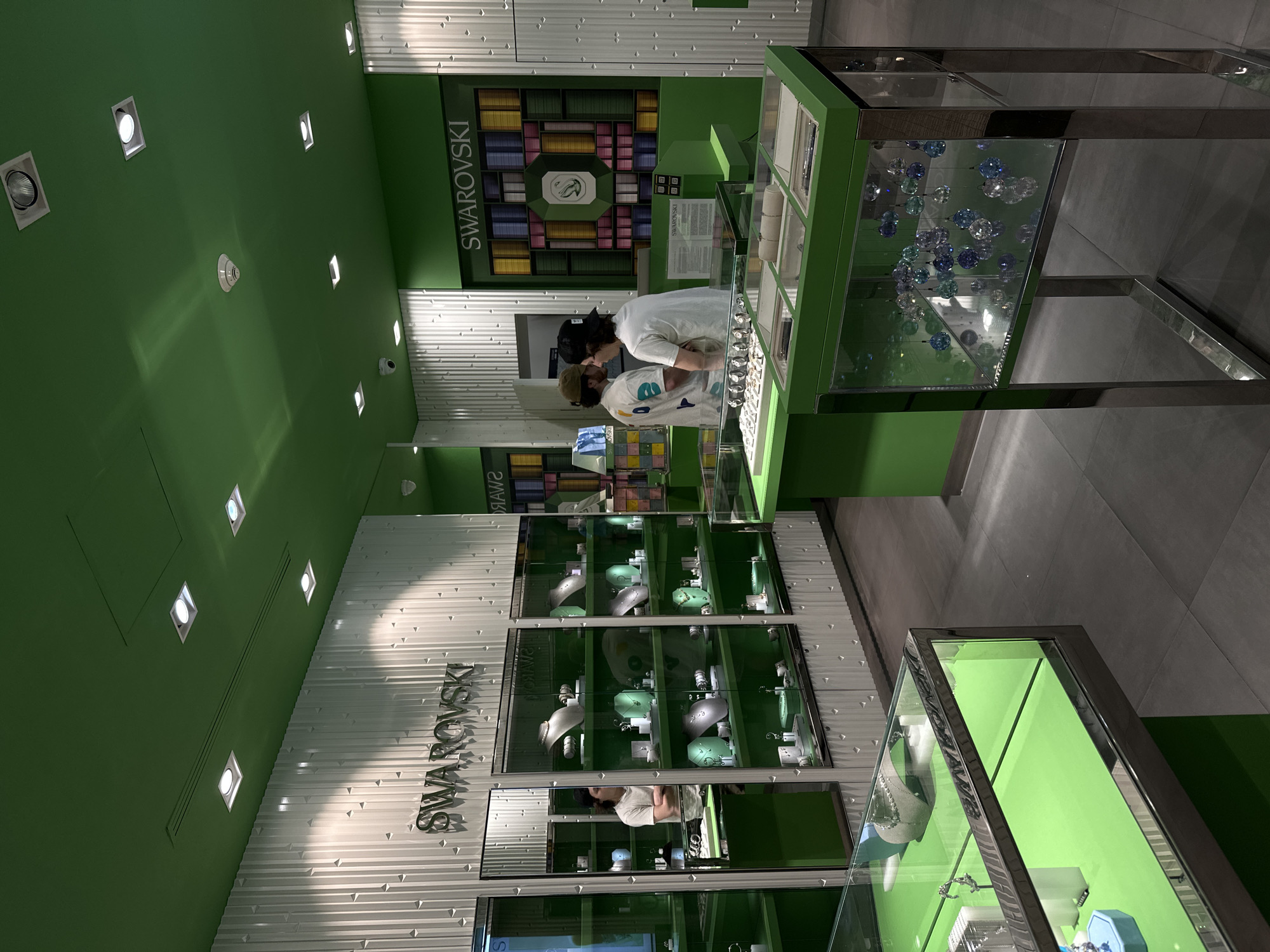 Customers browse jewelry at Swarovski store in Huixquilucan