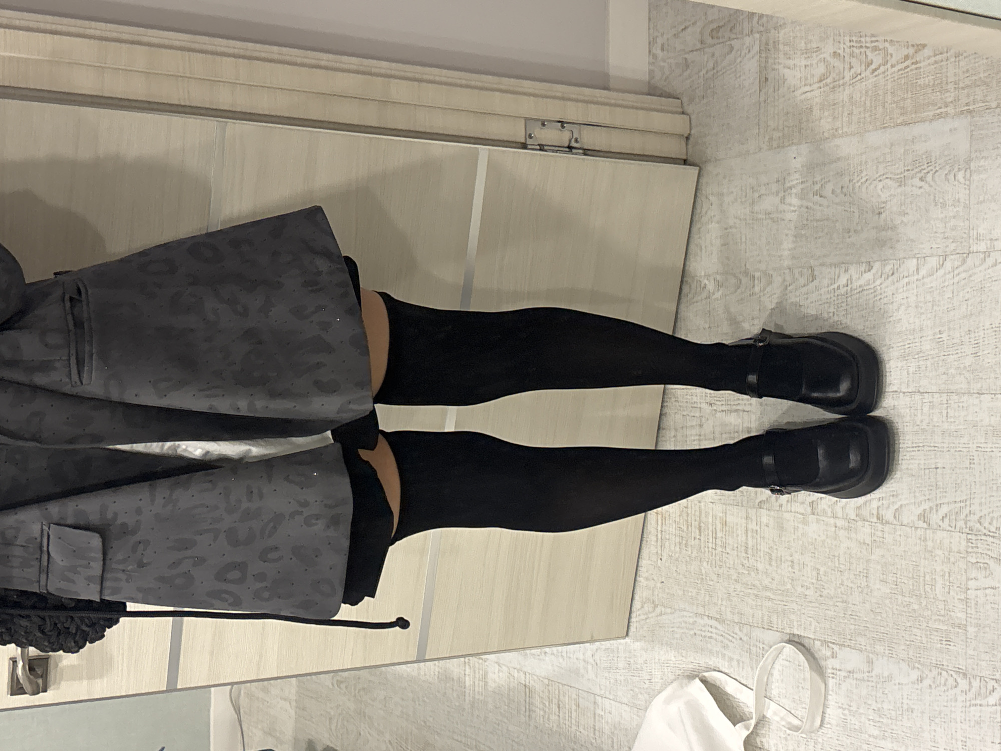 Person in dark gray clothing photographed indoors in Krasnoyarsk