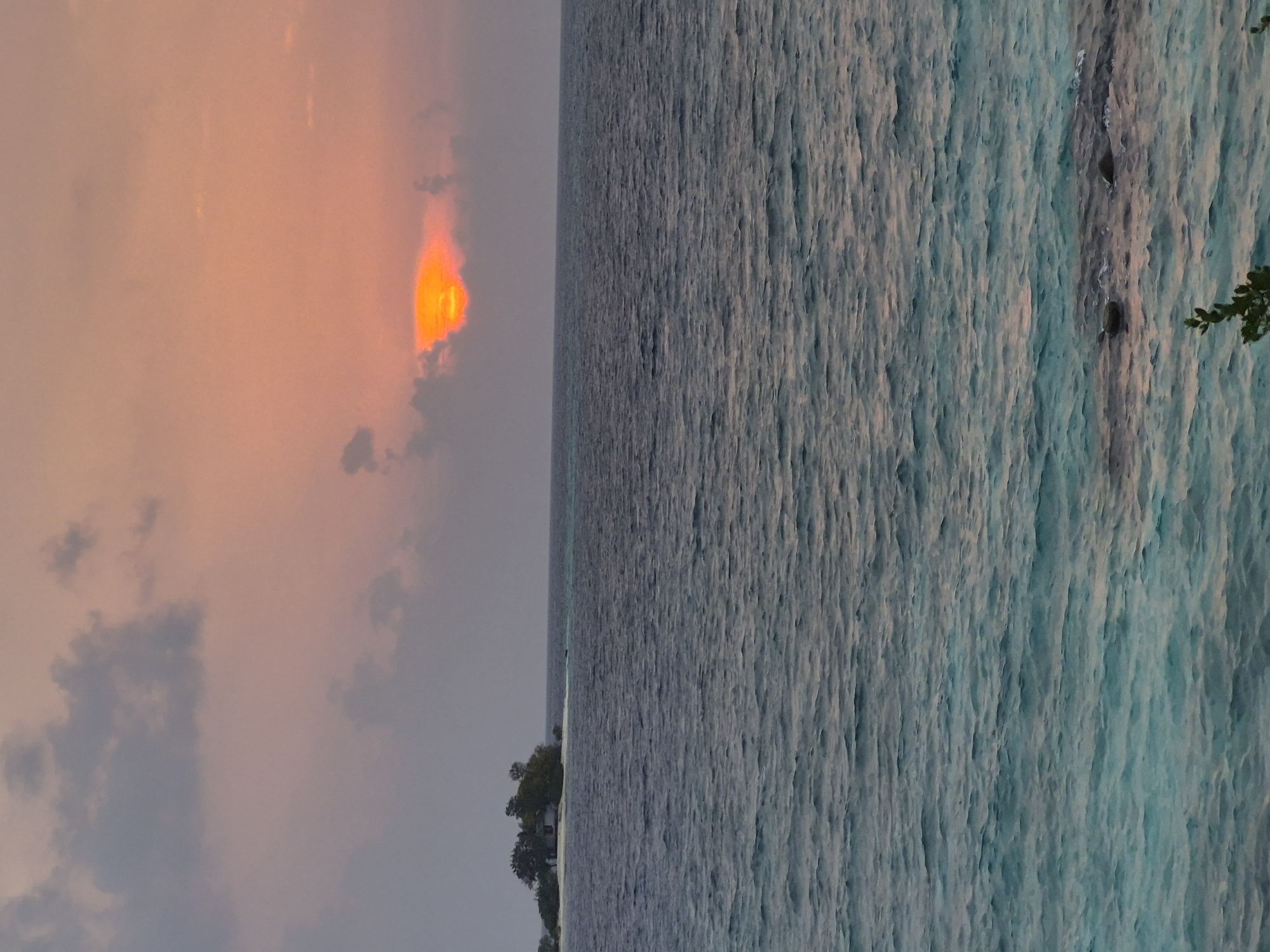 Sunset observed over ocean waters in Huraa, Maldives