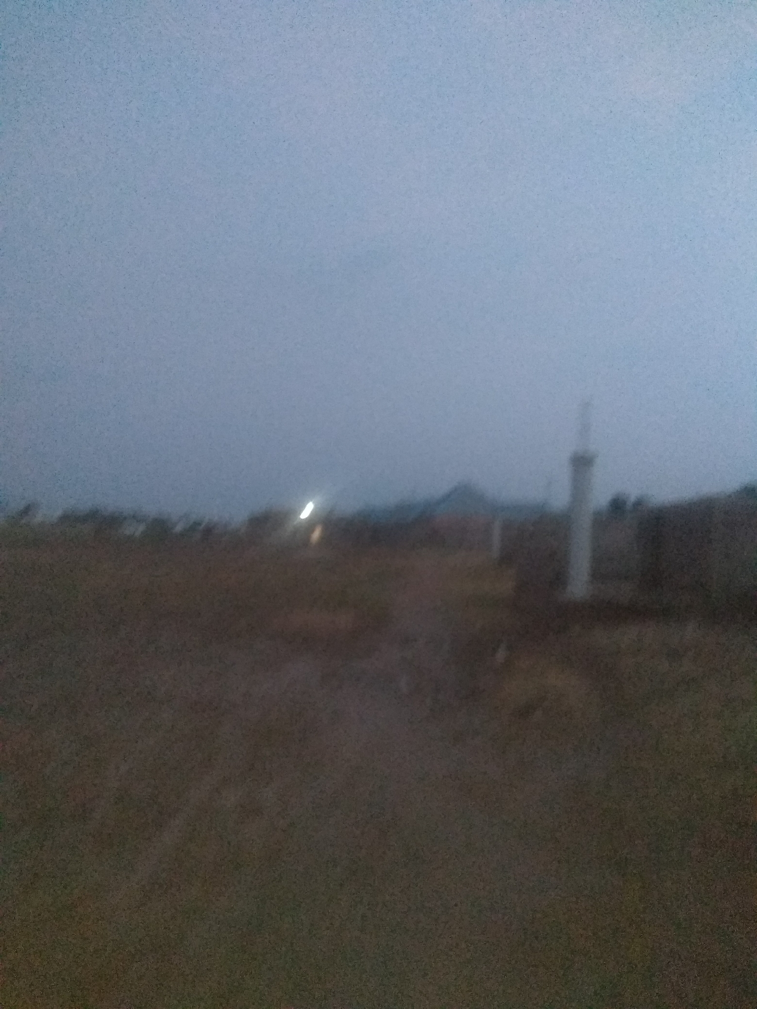 Dusk falls over a quiet Jalingo neighborhood