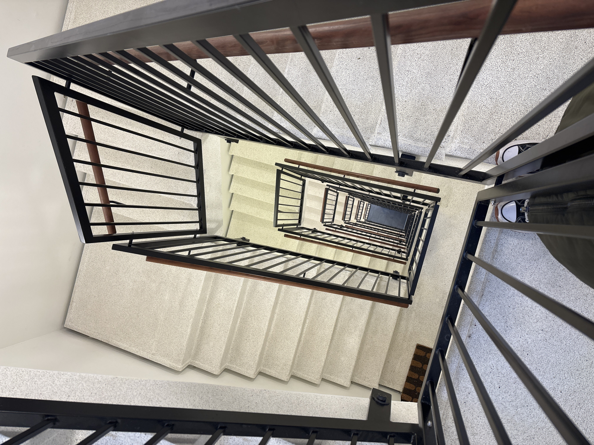 Spiral staircase photographed from above in Copenhagen building