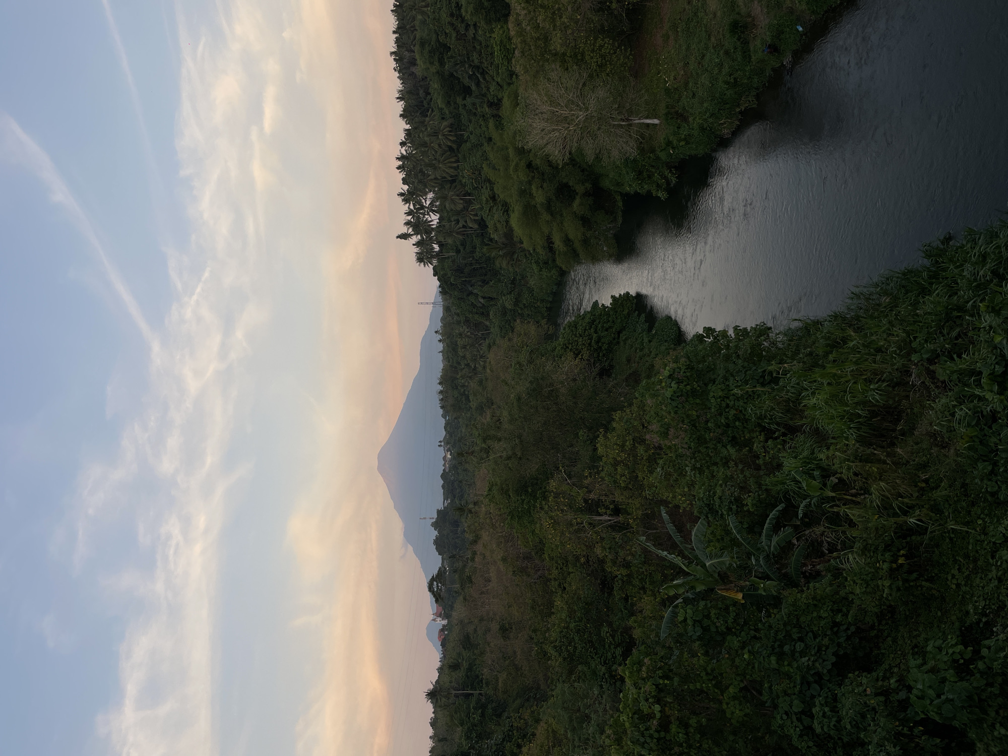 River, mountain, and road at golden hour in Maumbi