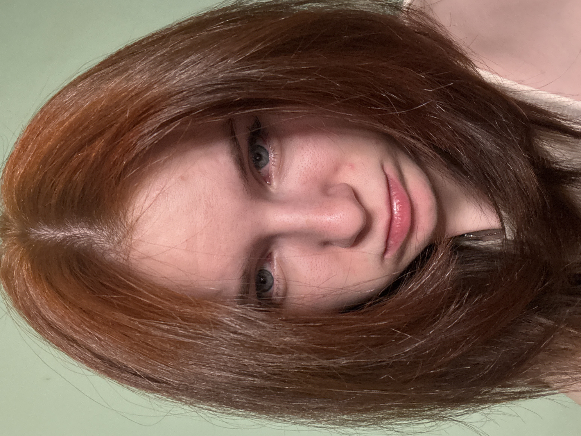 Red-haired woman photographed in bedroom setting over six minutes